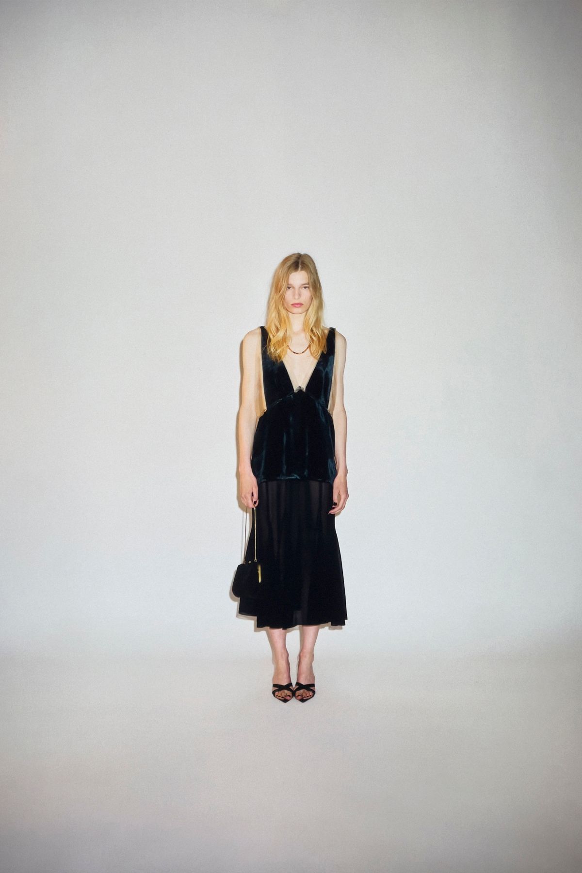 black velvet sleeveless v-neck fitted top