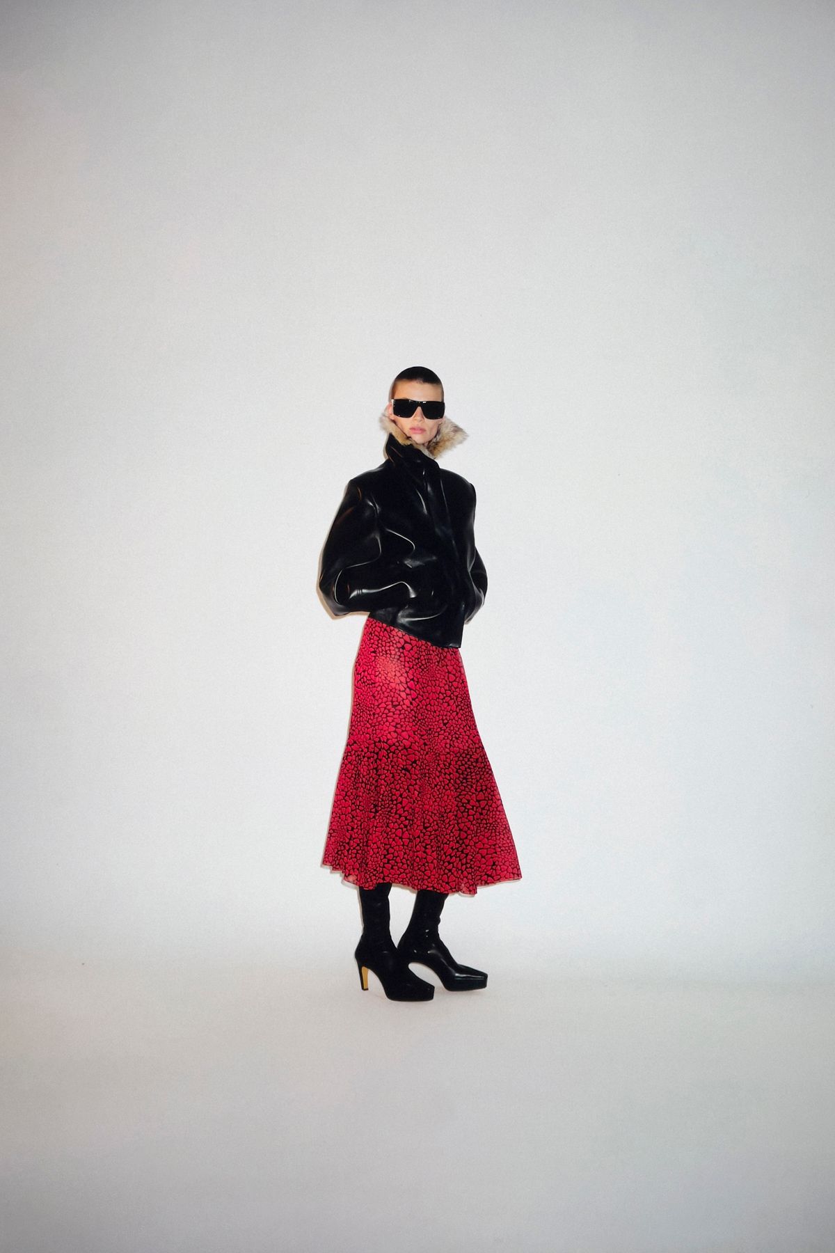 black leather long-sleeve collared fitted zippered jacket