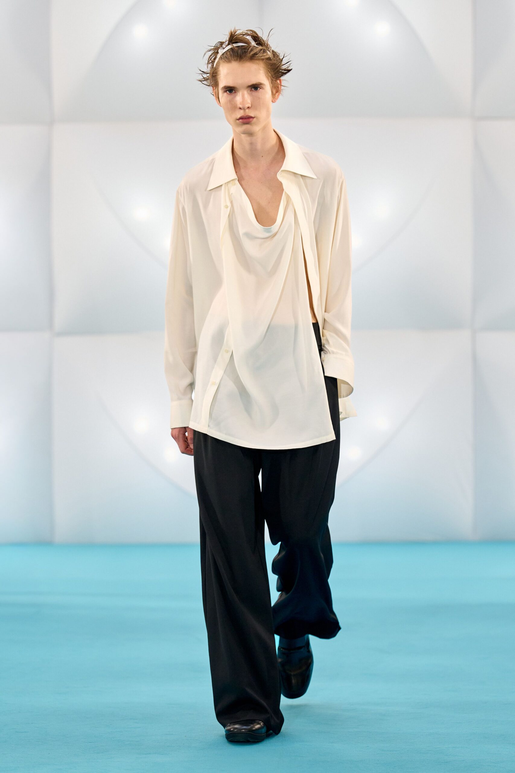 white relaxed shirt black pants
