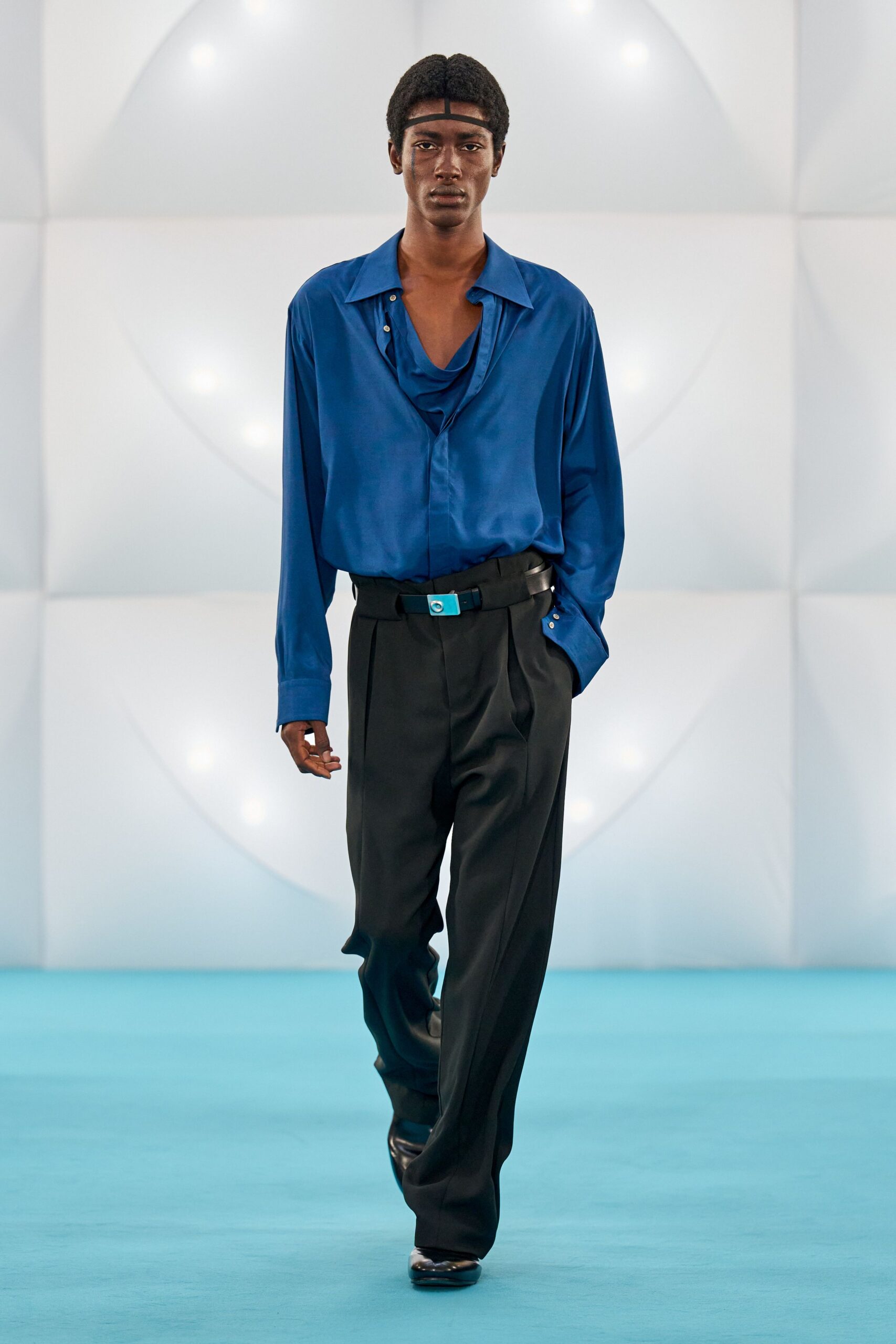 blue silk shirt black tailored pants