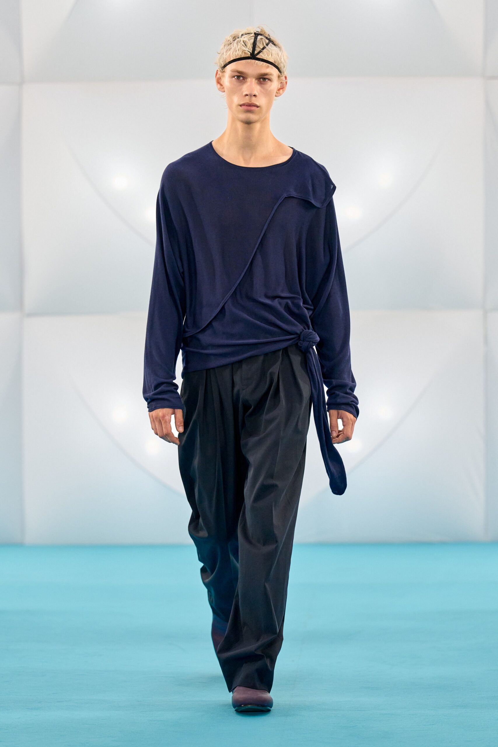 blue relaxed top with black pants