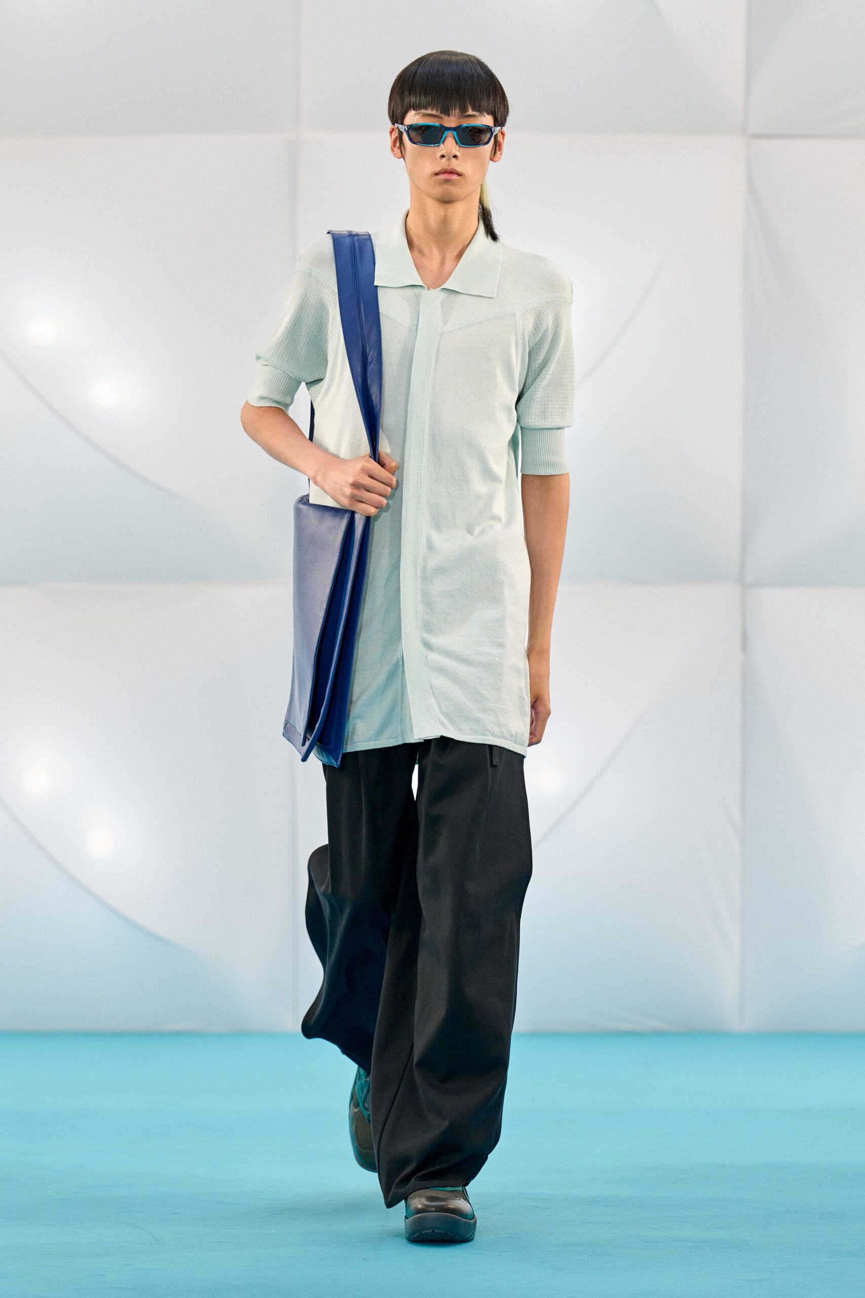 blue relaxed shirt with black pants