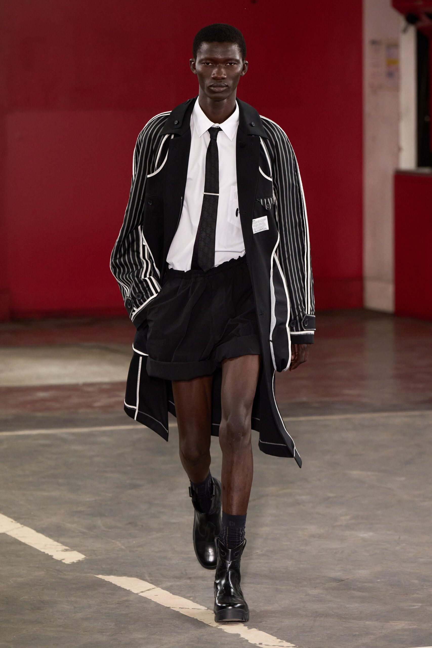black cotton long-sleeve collared relaxed striped coat