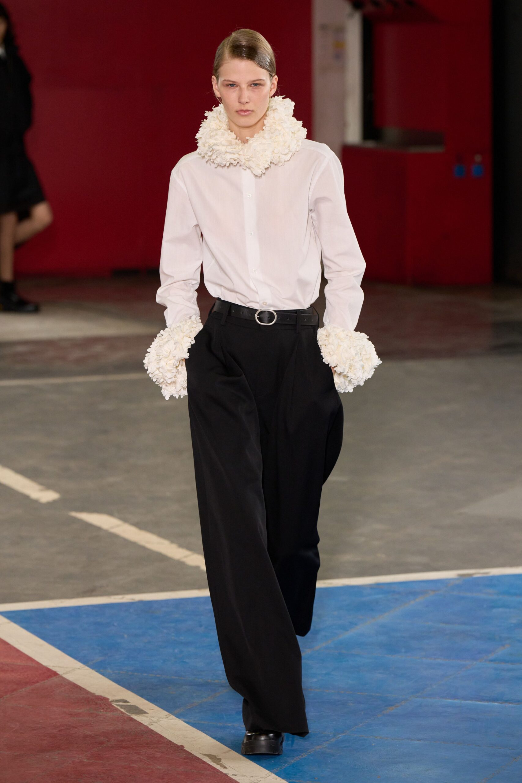 white fitted shirt black wide-leg pants