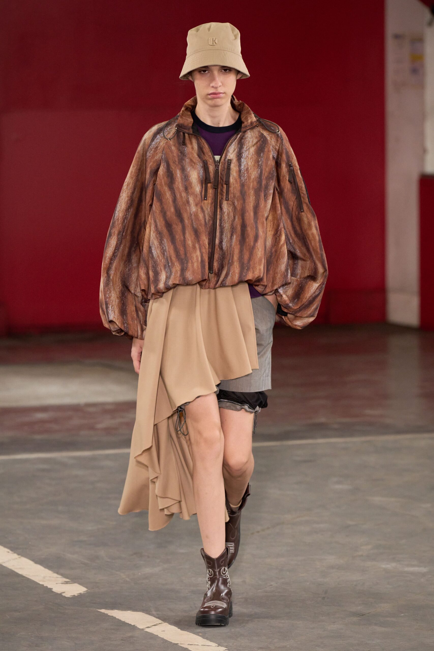 brown relaxed jacket with beige skirt