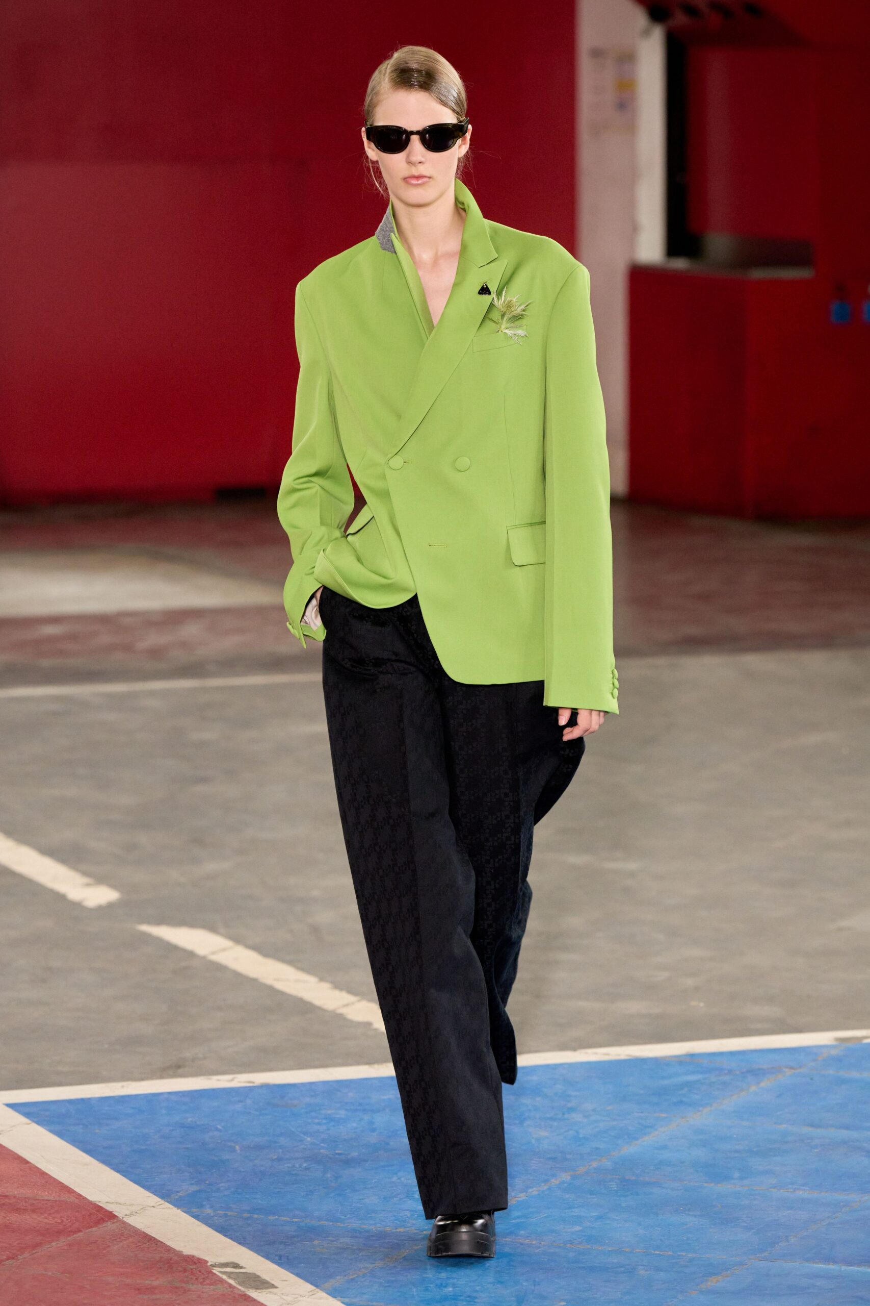 green oversized blazer with black pants