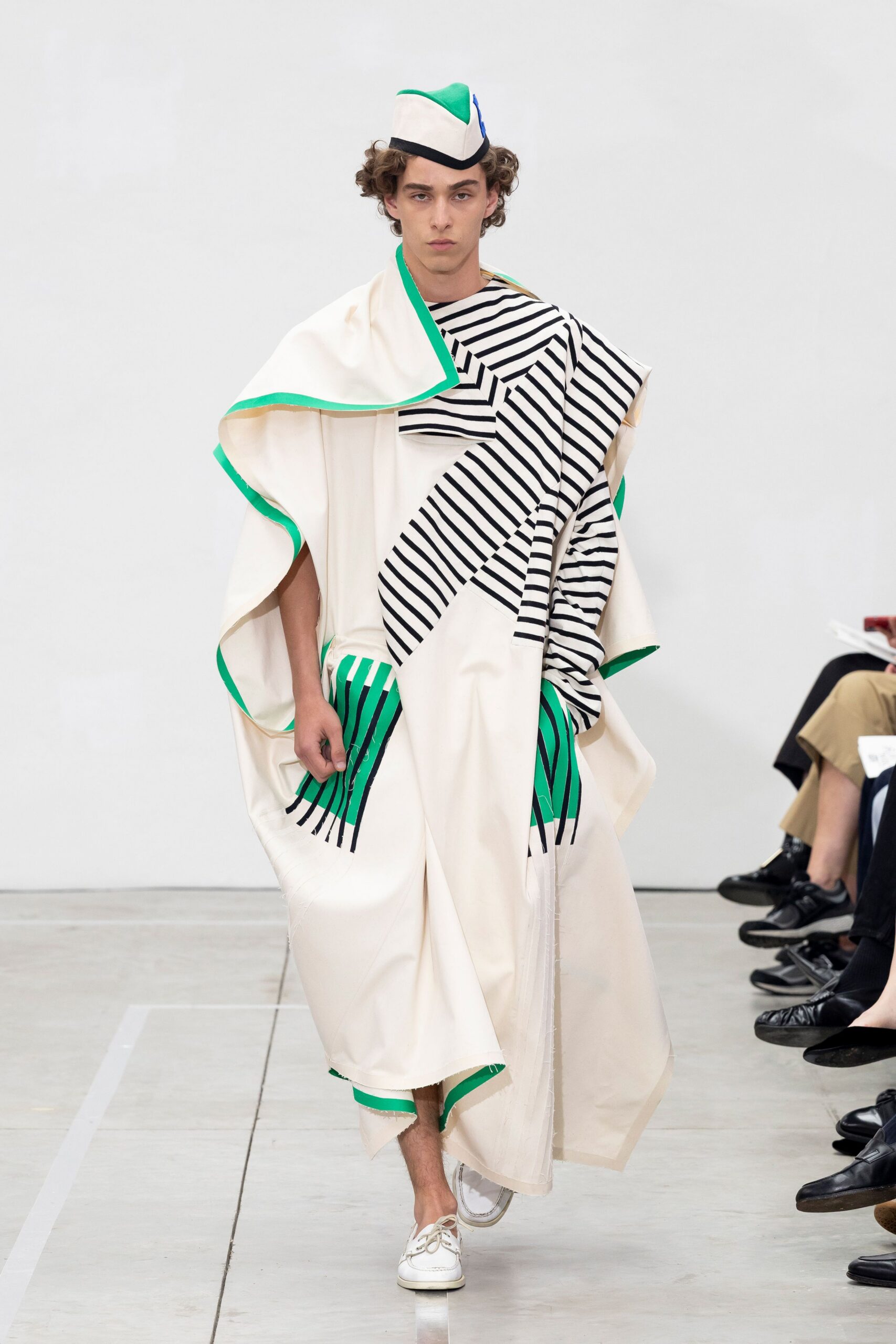 white printed cape with hat