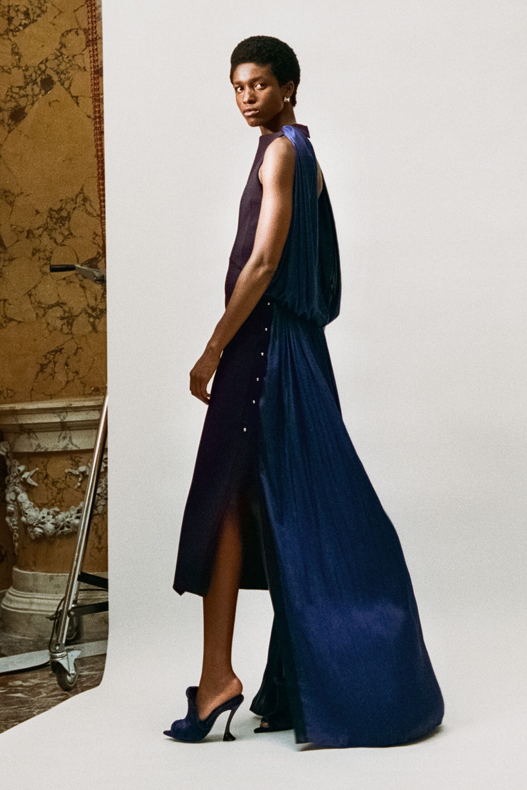 blue silk sleeveless high-neck fitted draped pleated dress