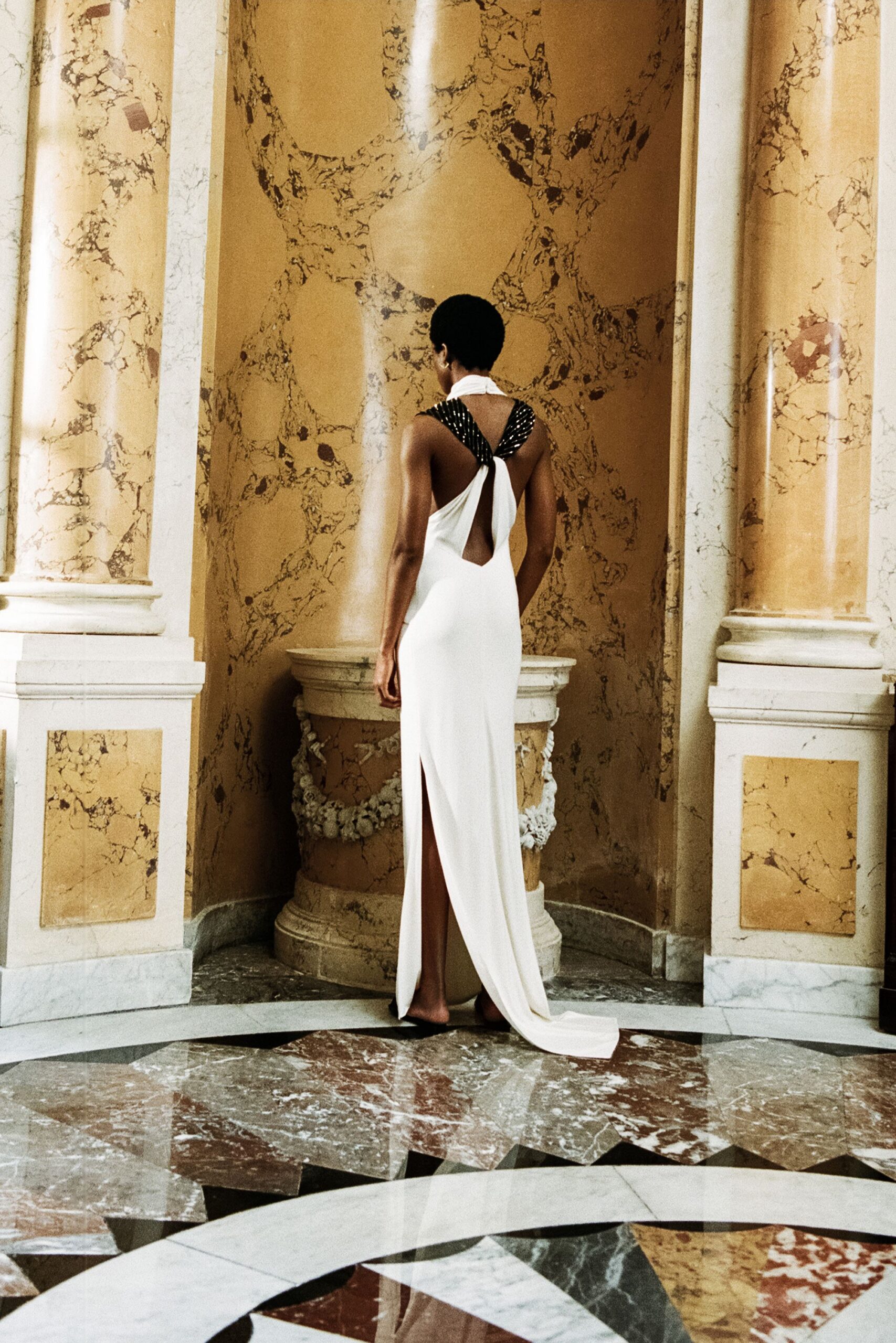 white silk sleeveless gown