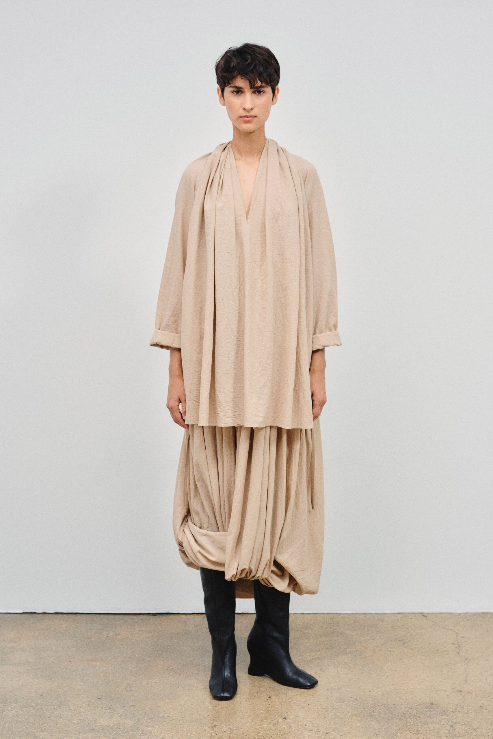 beige cotton long-sleeve v-neck relaxed draped top