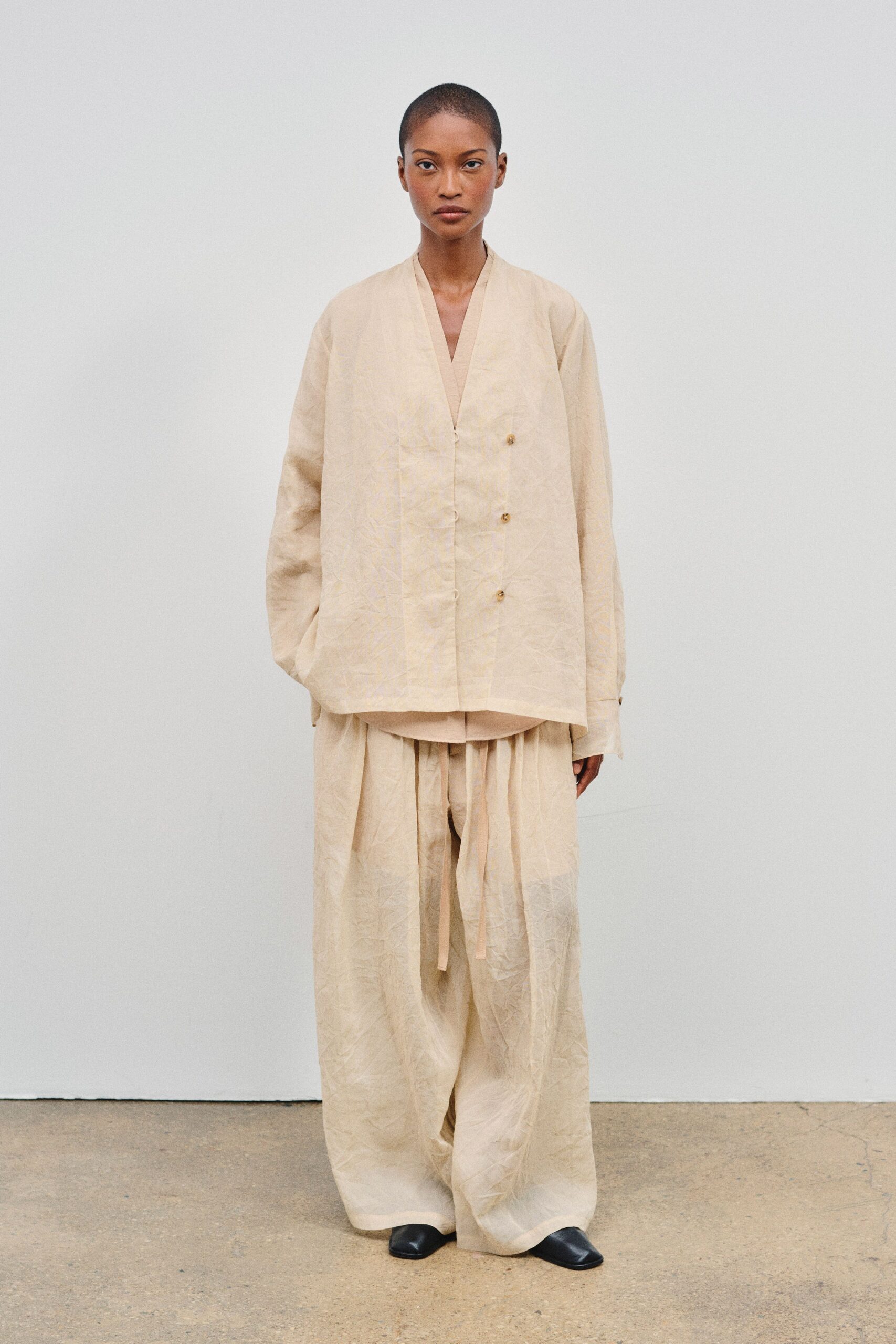 beige linen long-sleeve collared oversized buttoned jacket