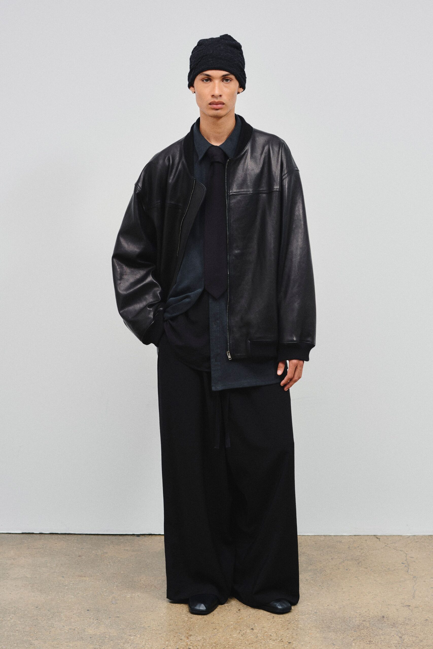 black leather long-sleeve oversized jacket