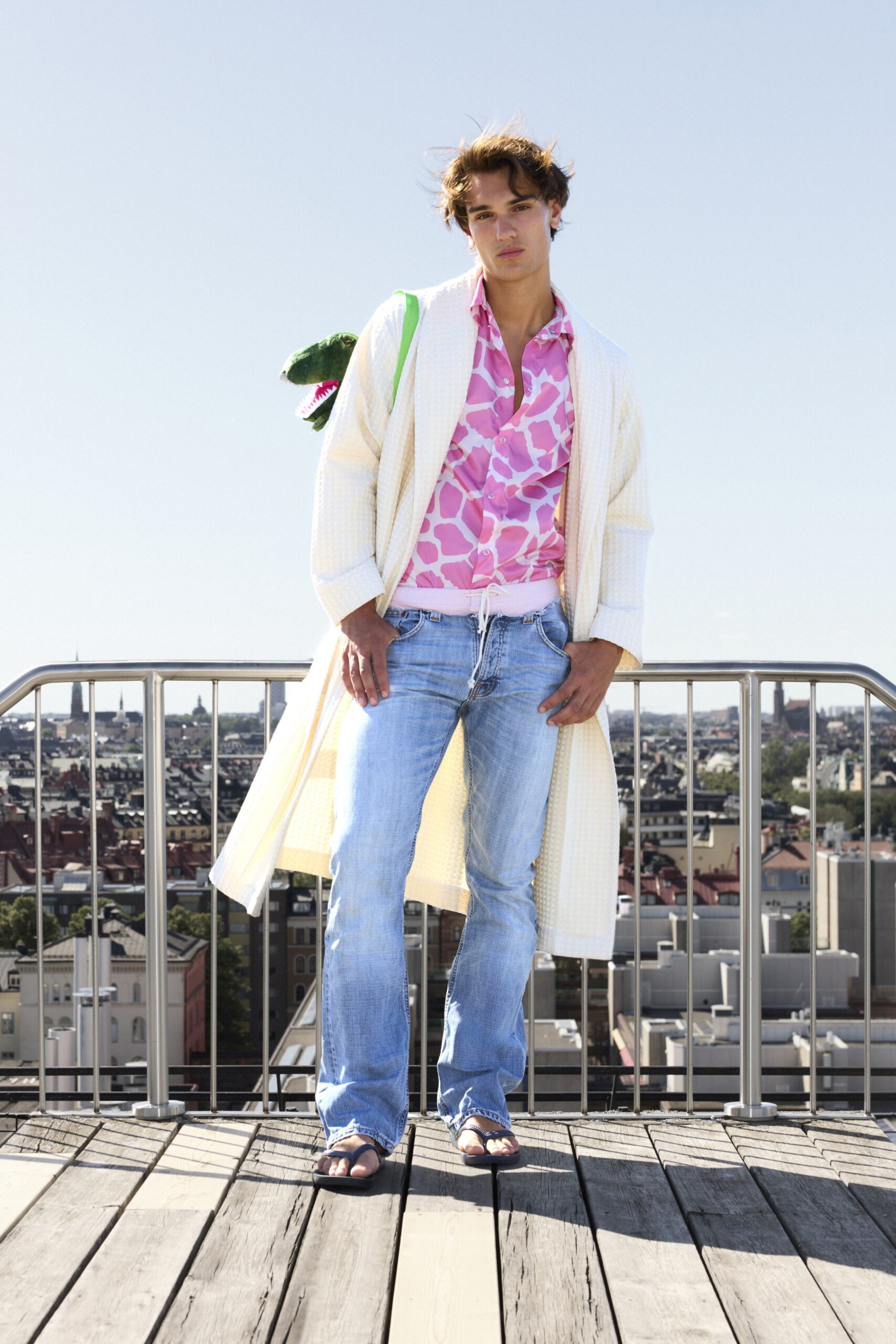 pink floral shirt with denim pants