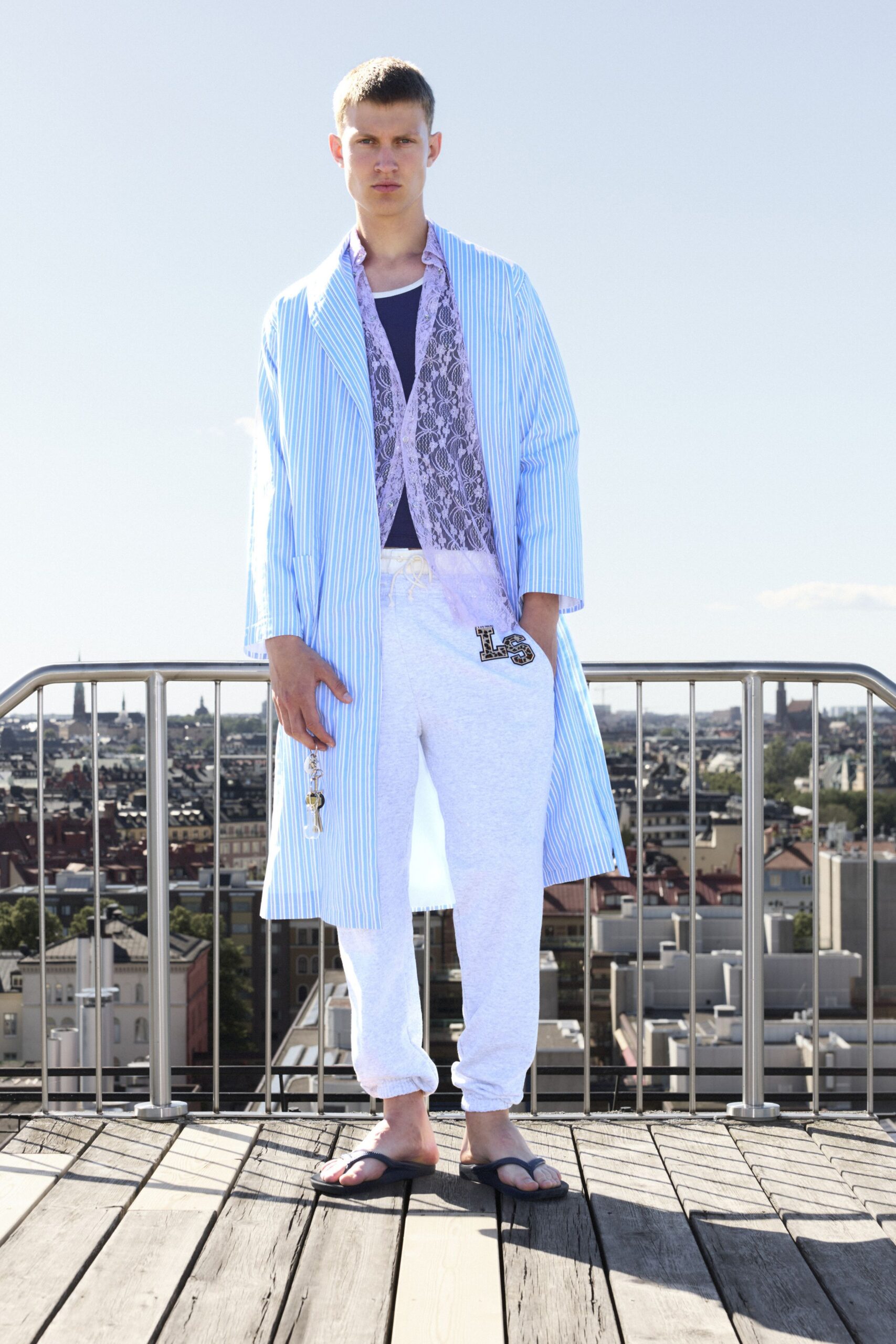 blue striped coat with purple top