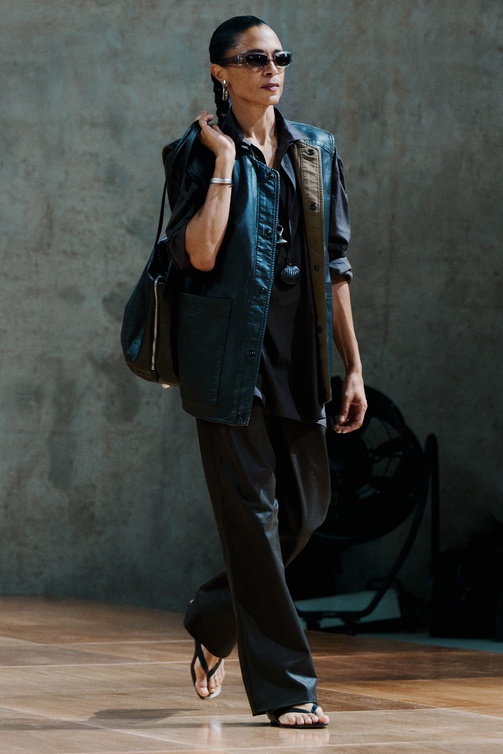 black leather long-sleeve collared relaxed zippered vest