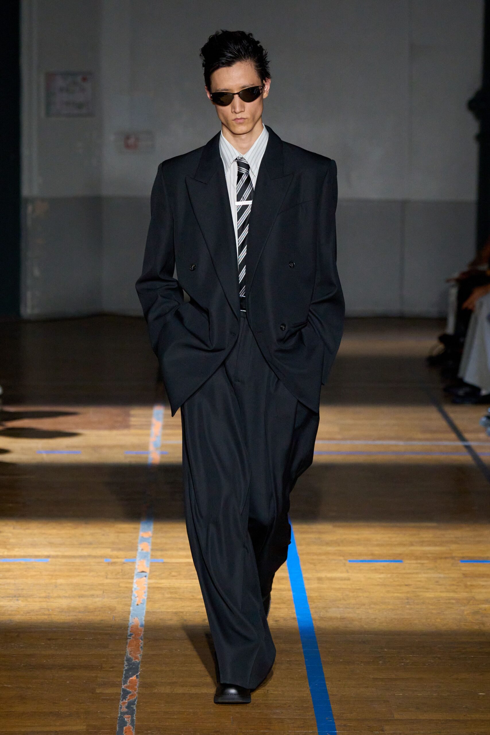 black long-sleeve collared tailored suit