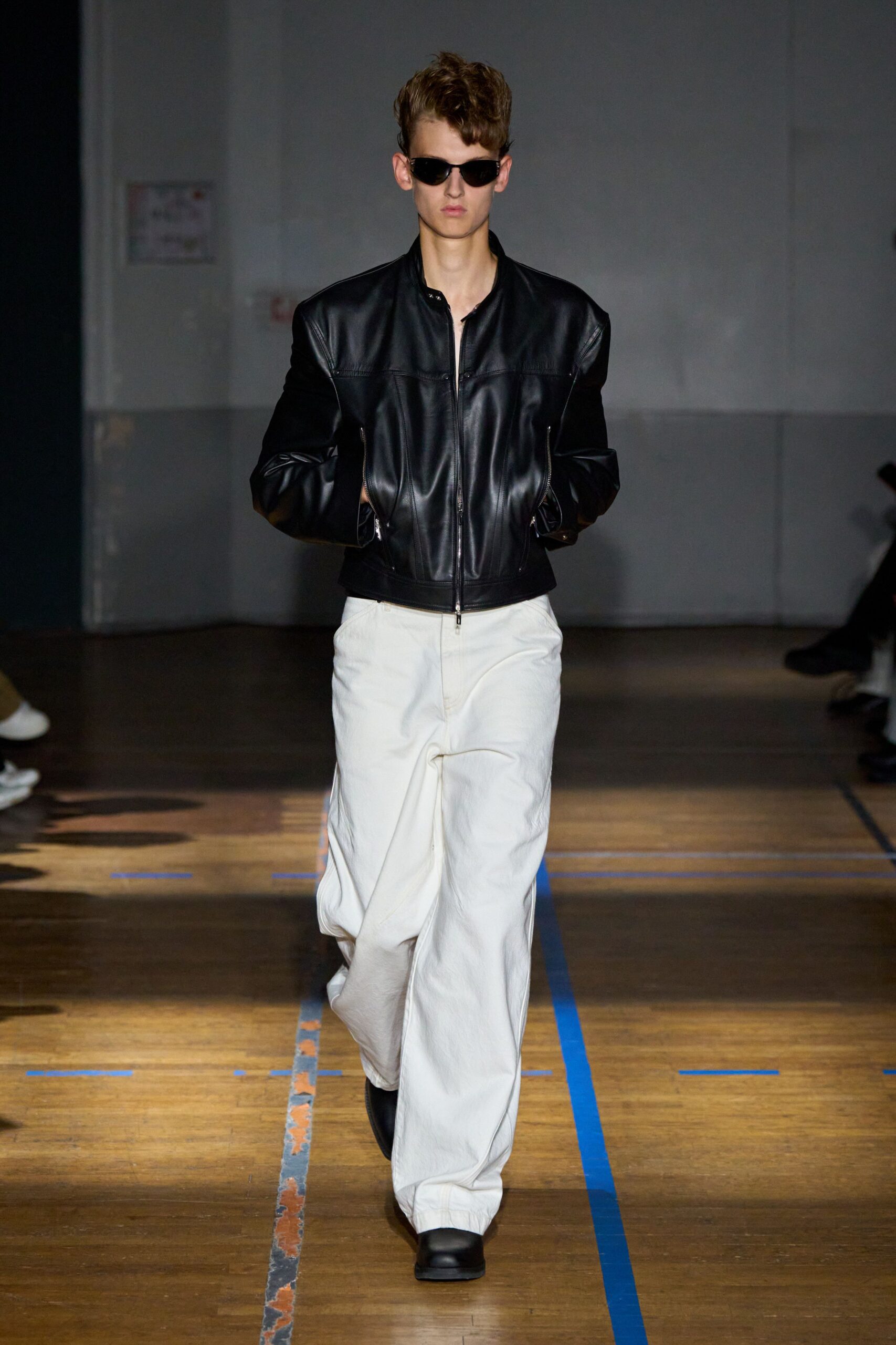 black leather jacket white pants