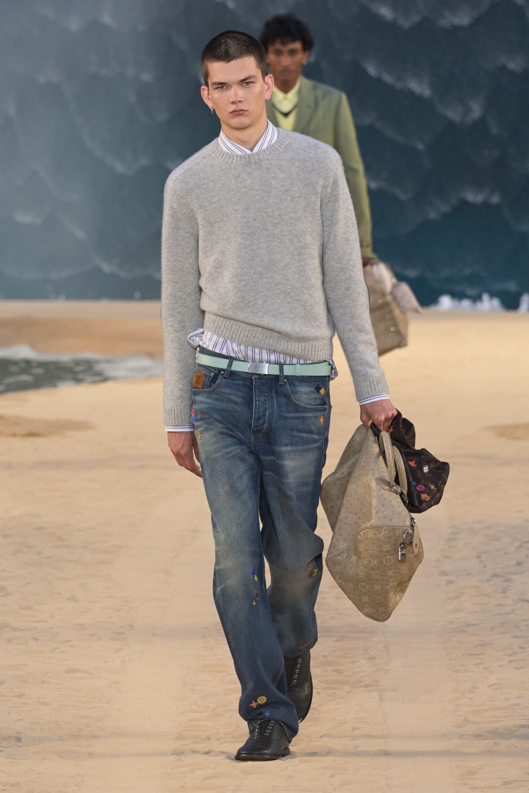 gray wool sweater with blue jeans