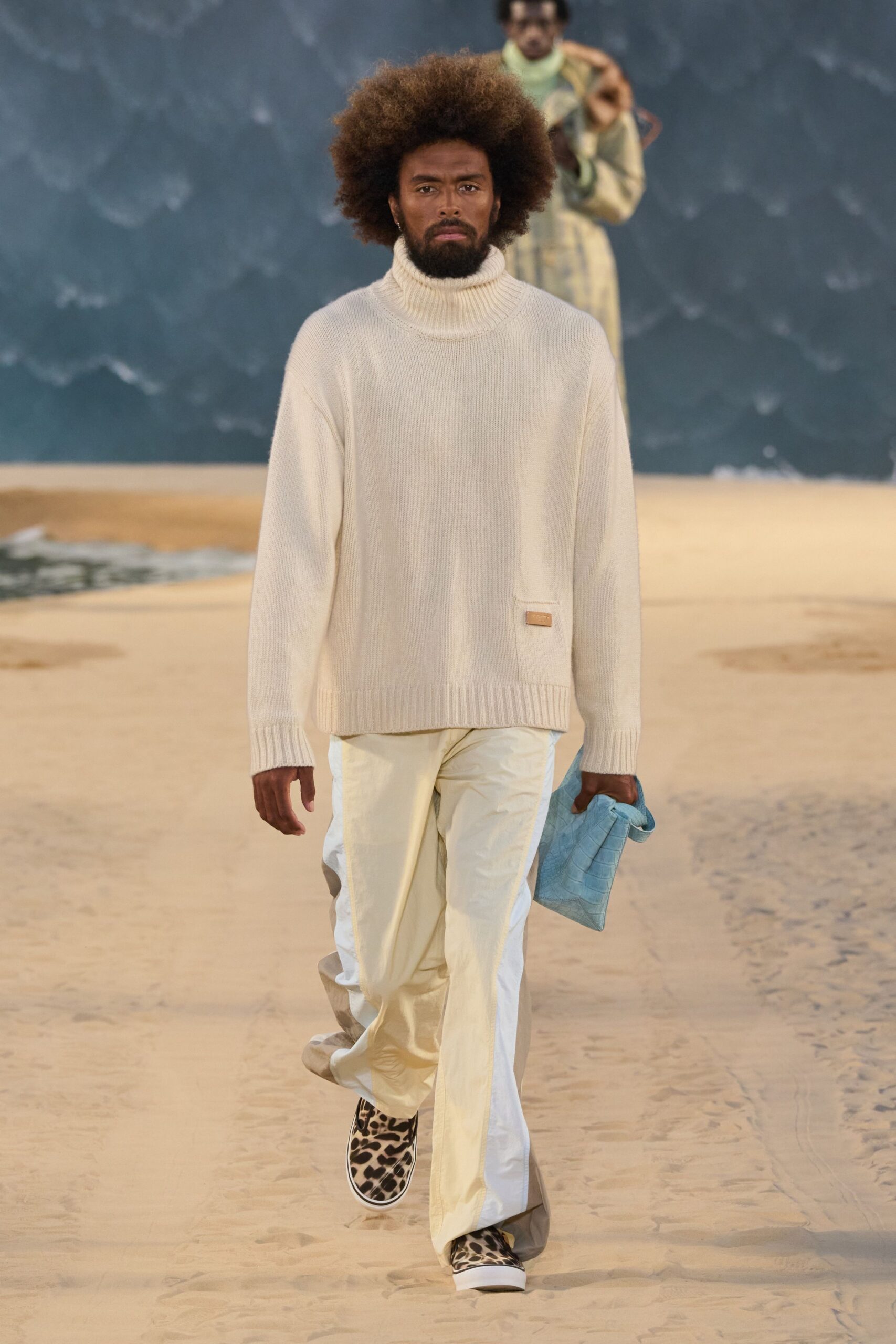 white relaxed sweater with beige pants
