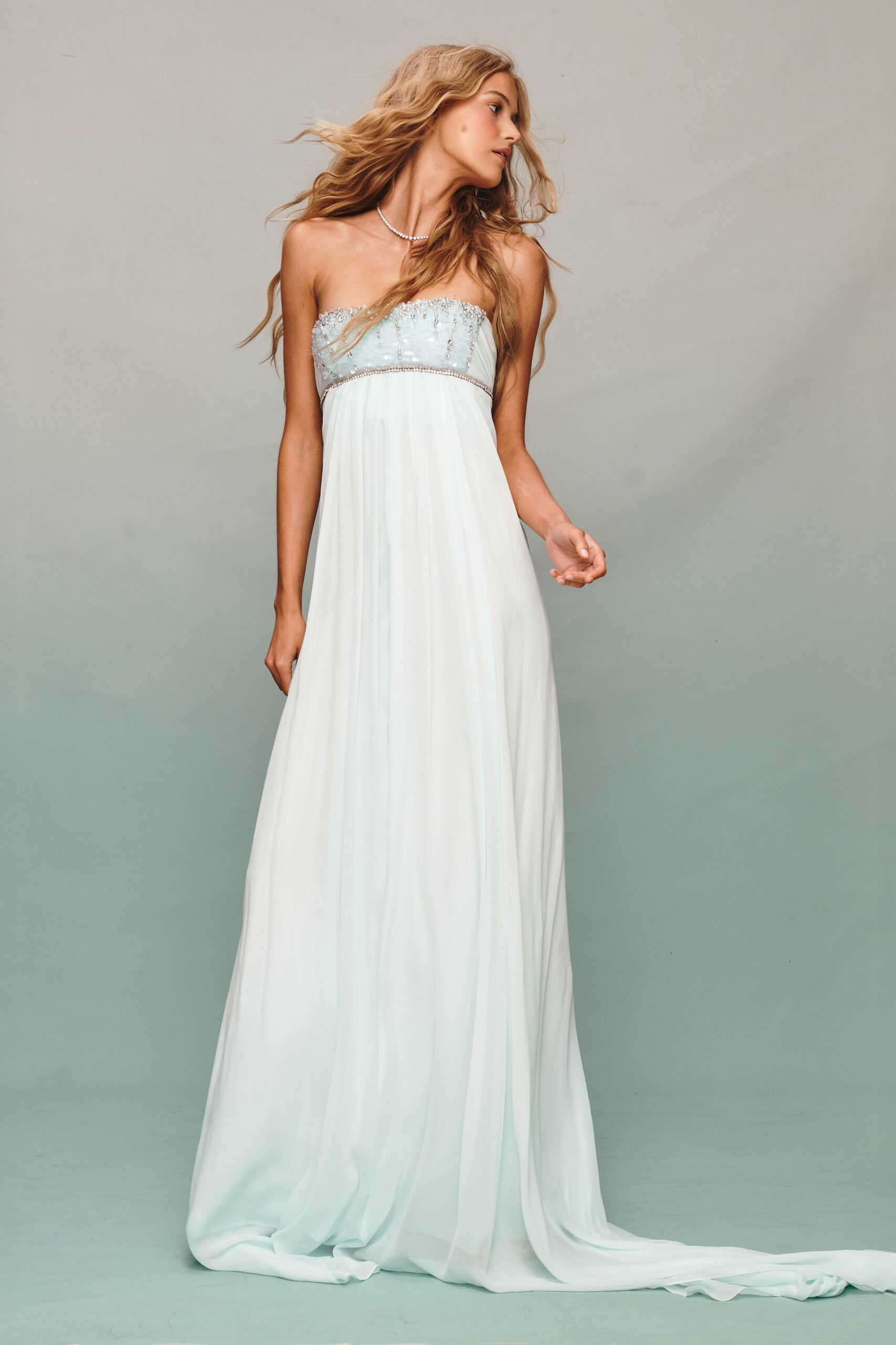 white silk strapless gown