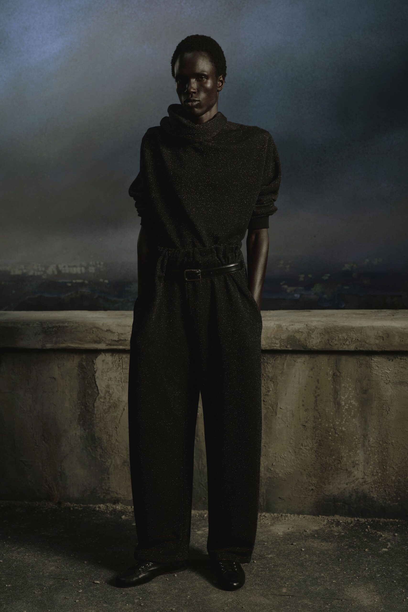 black wool long-sleeve high-neck relaxed textured top