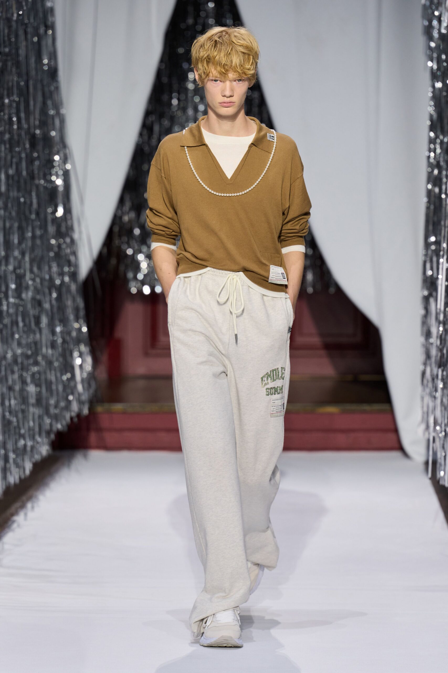 brown relaxed top with gray pants