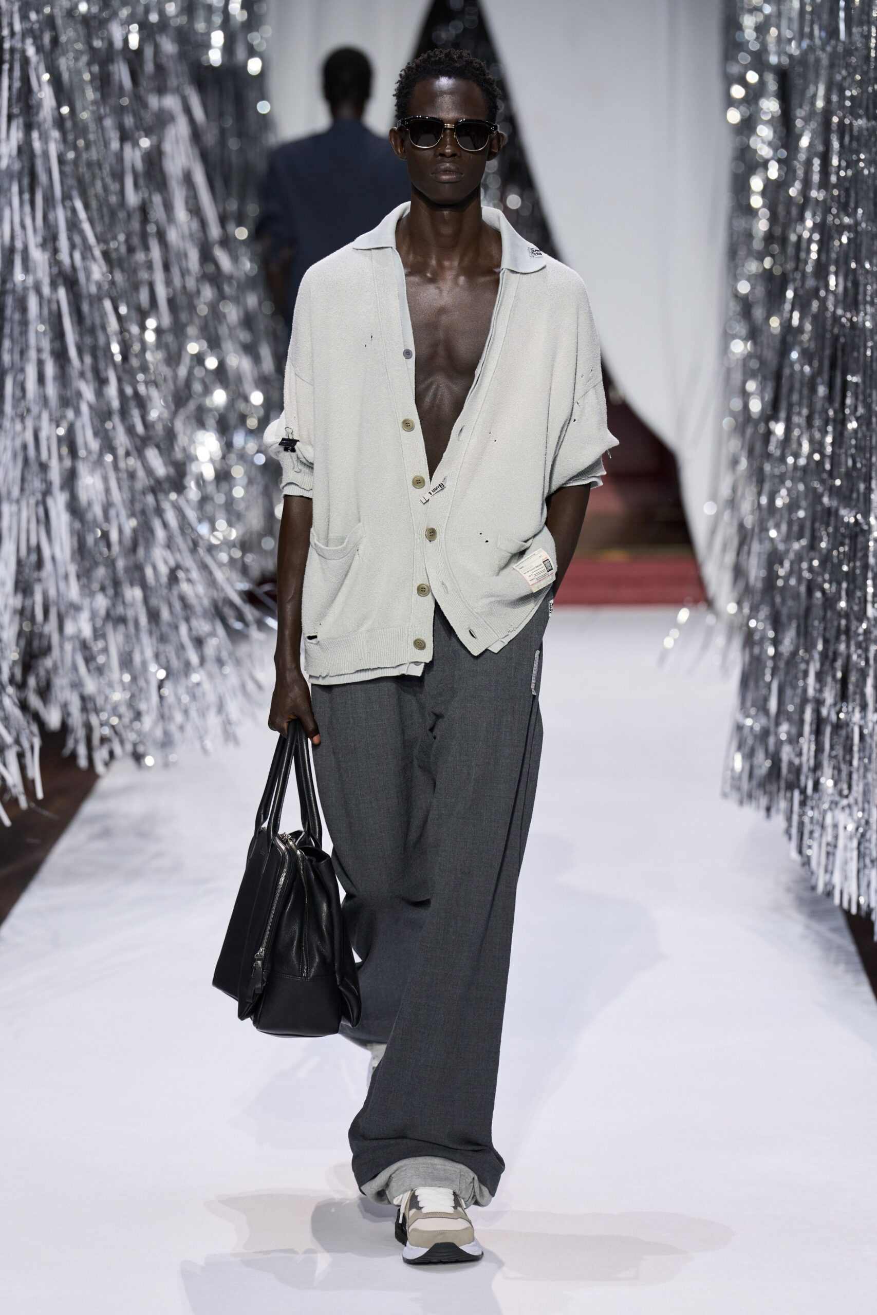 white relaxed shirt gray pants