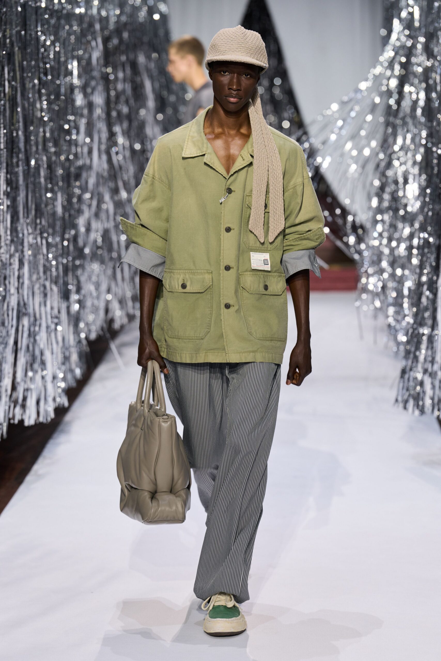 green relaxed jacket with striped pants