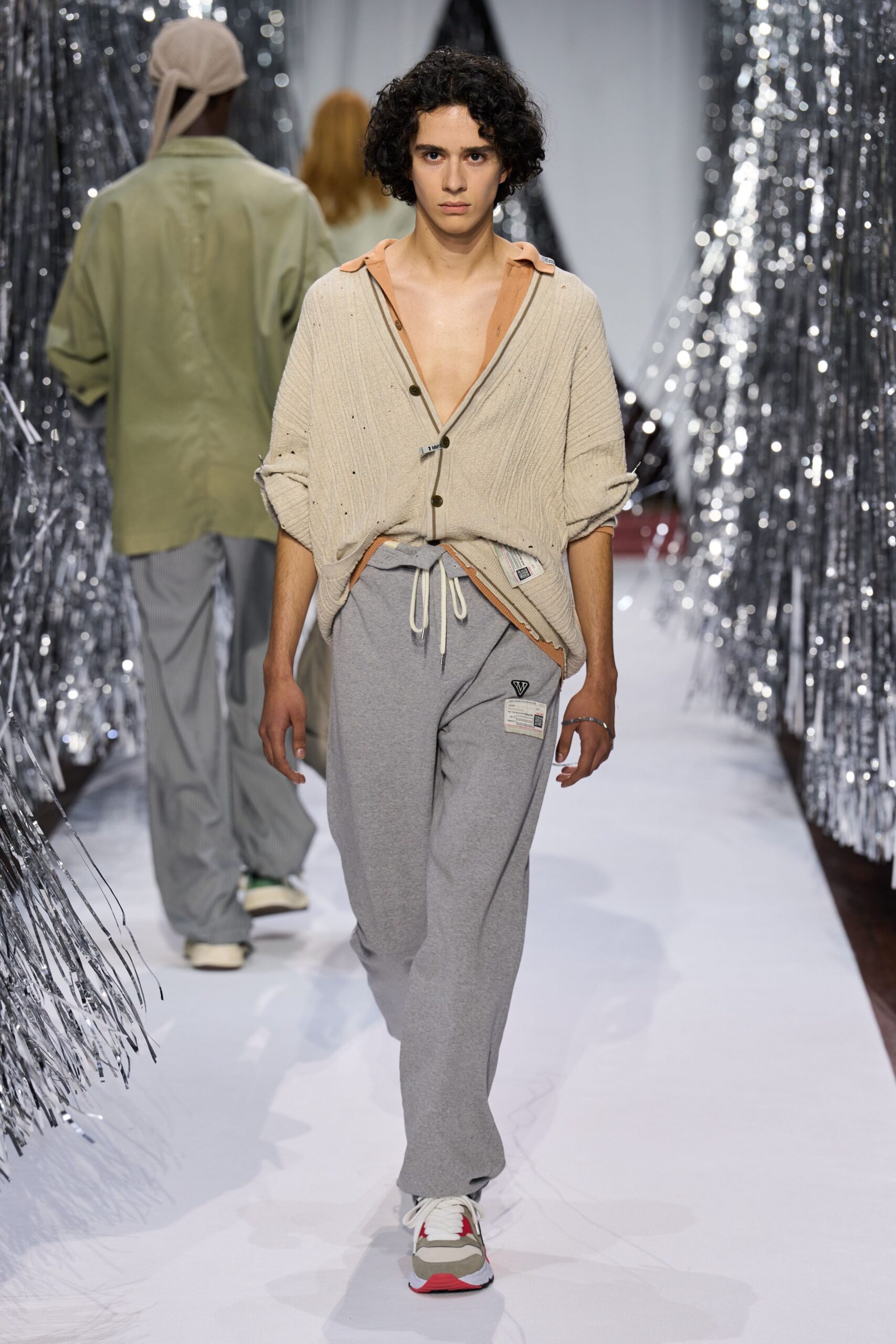 beige relaxed shirt gray pants