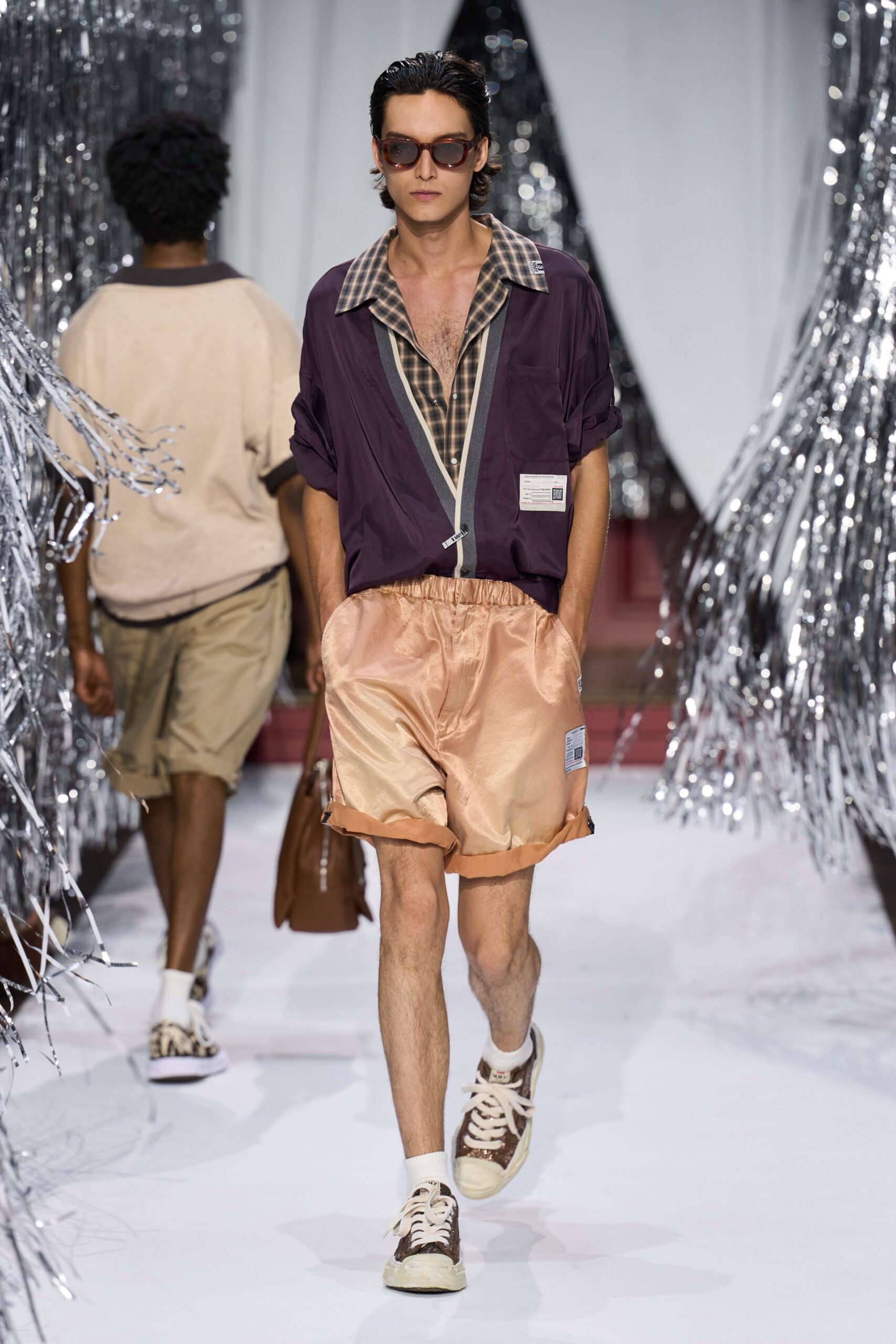 purple collared shirt with orange shorts