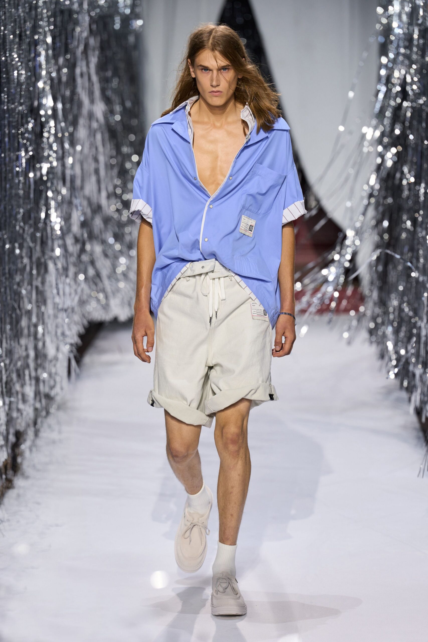 blue cotton shirt and white shorts