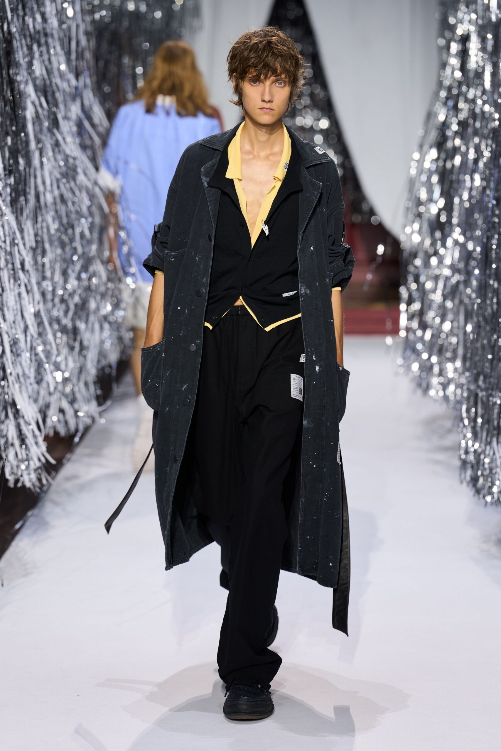 black relaxed coat with yellow shirt