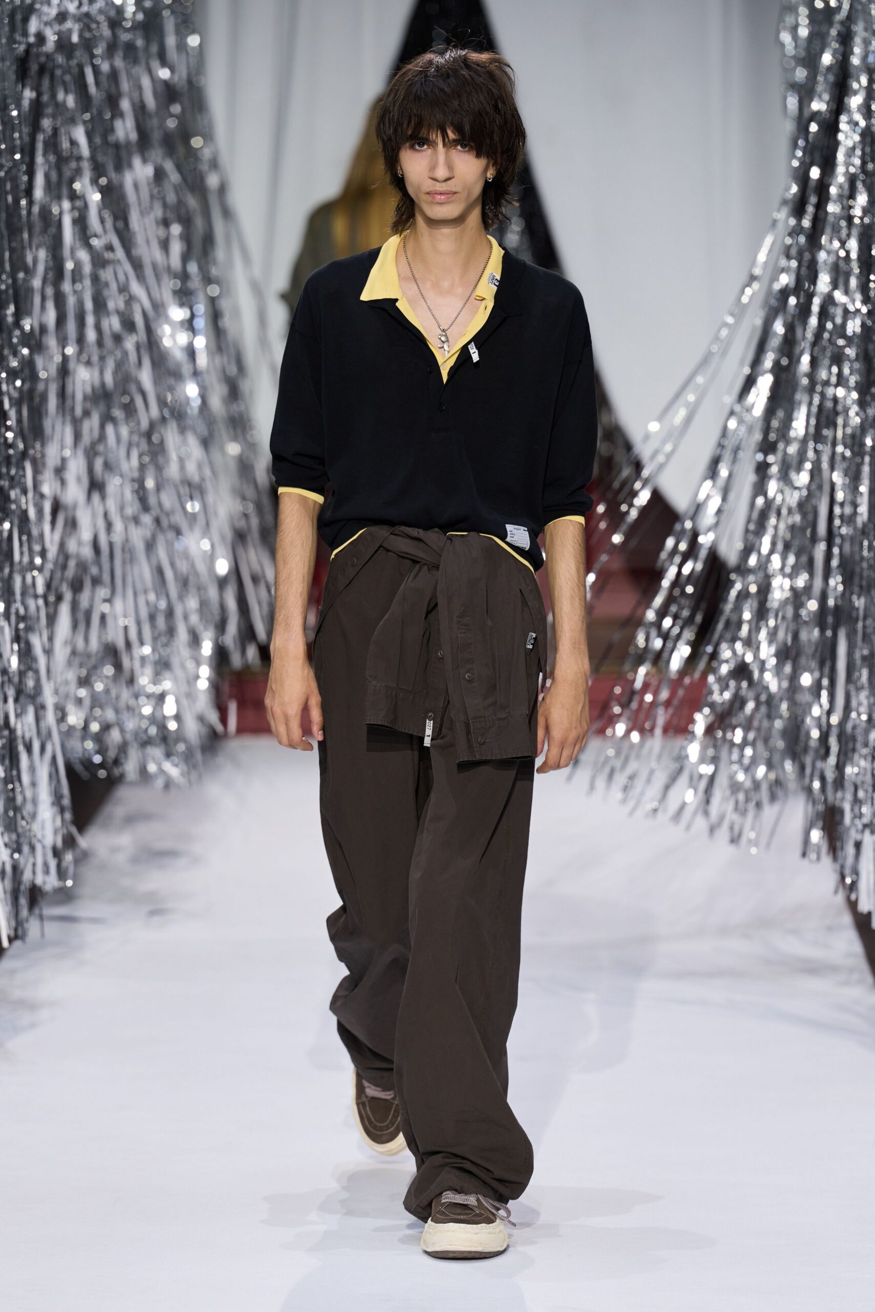 black and yellow relaxed shirt with brown pants