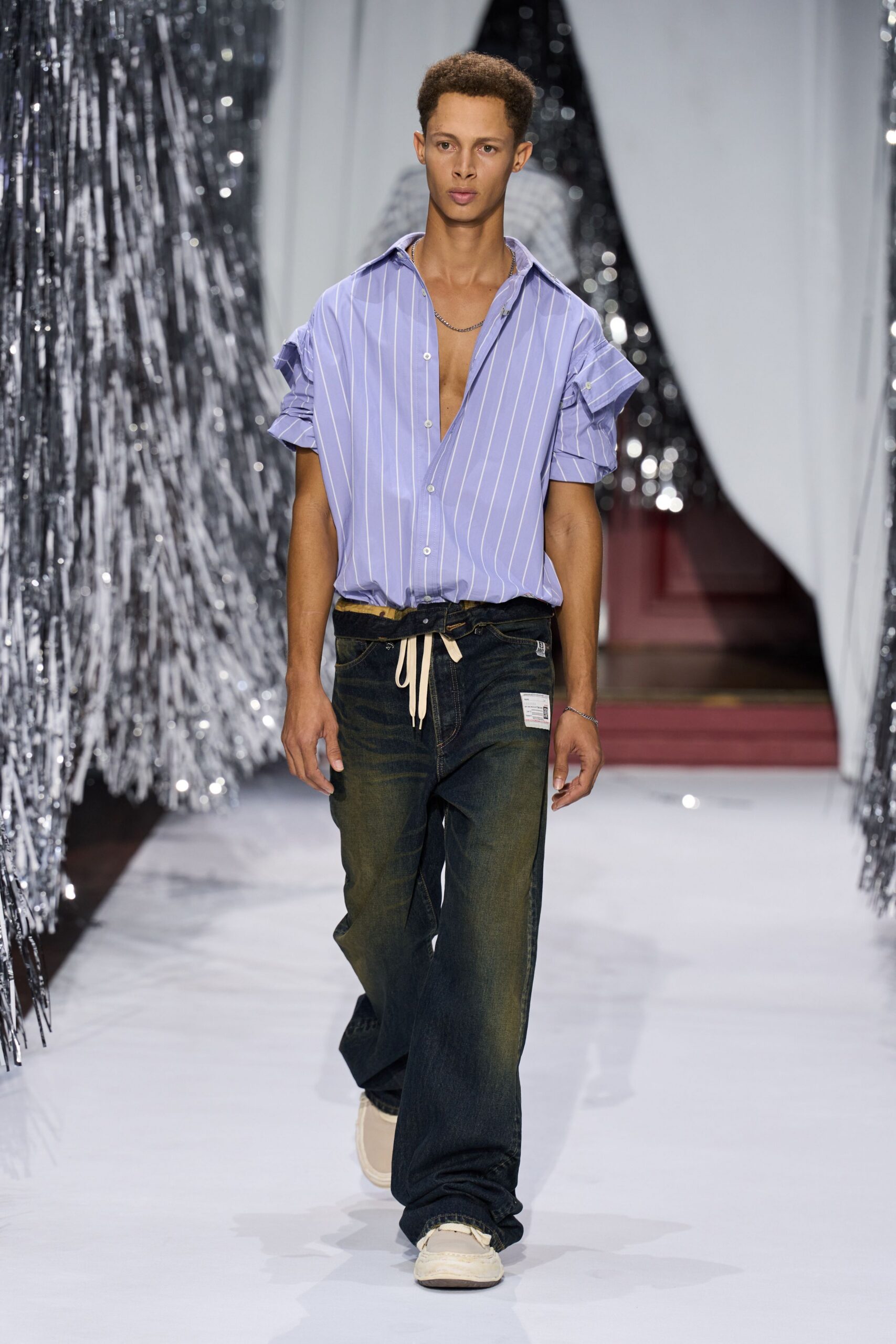 blue striped shirt with black jeans