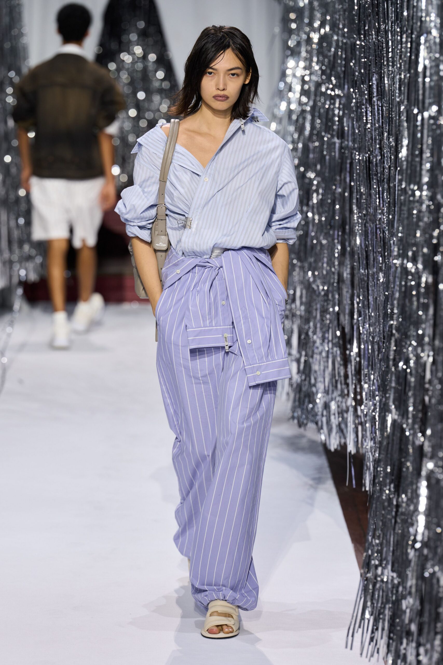 blue striped shirt and purple pants