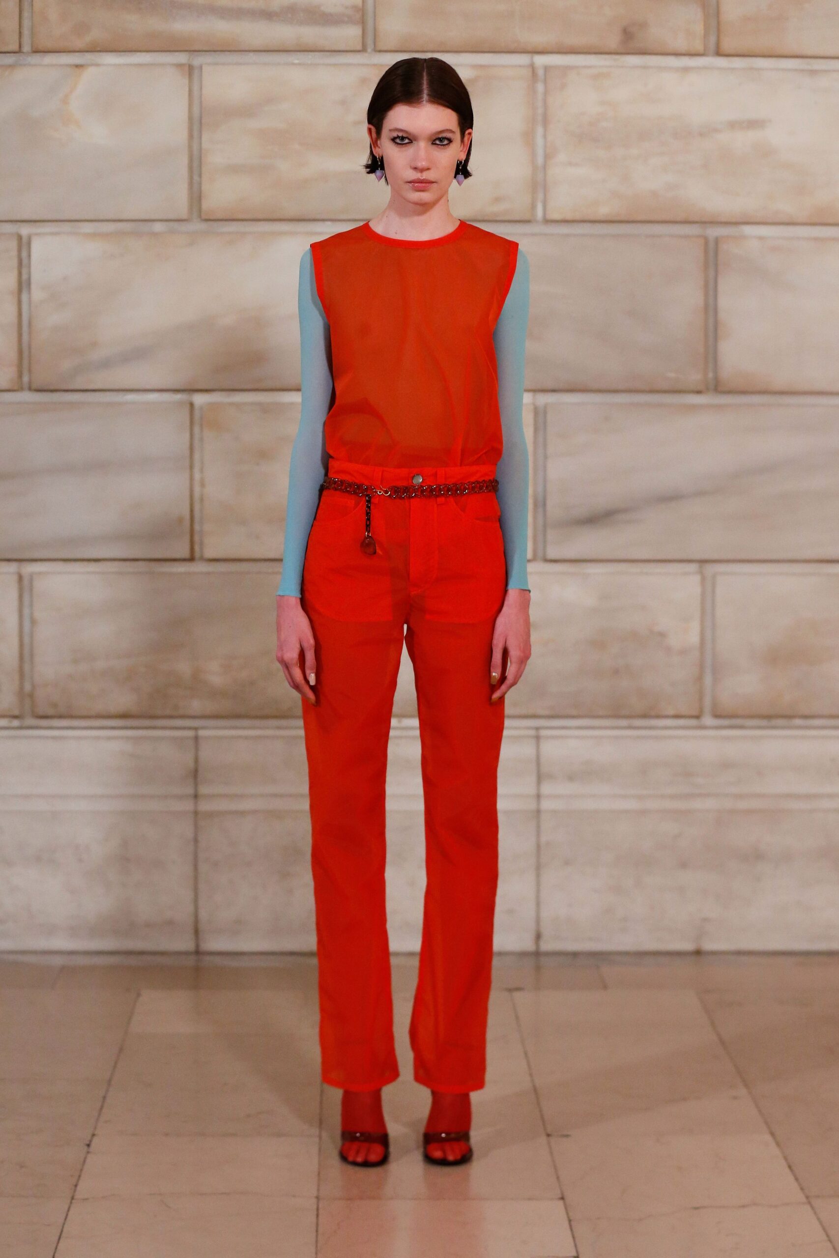 blue fitted top red pants