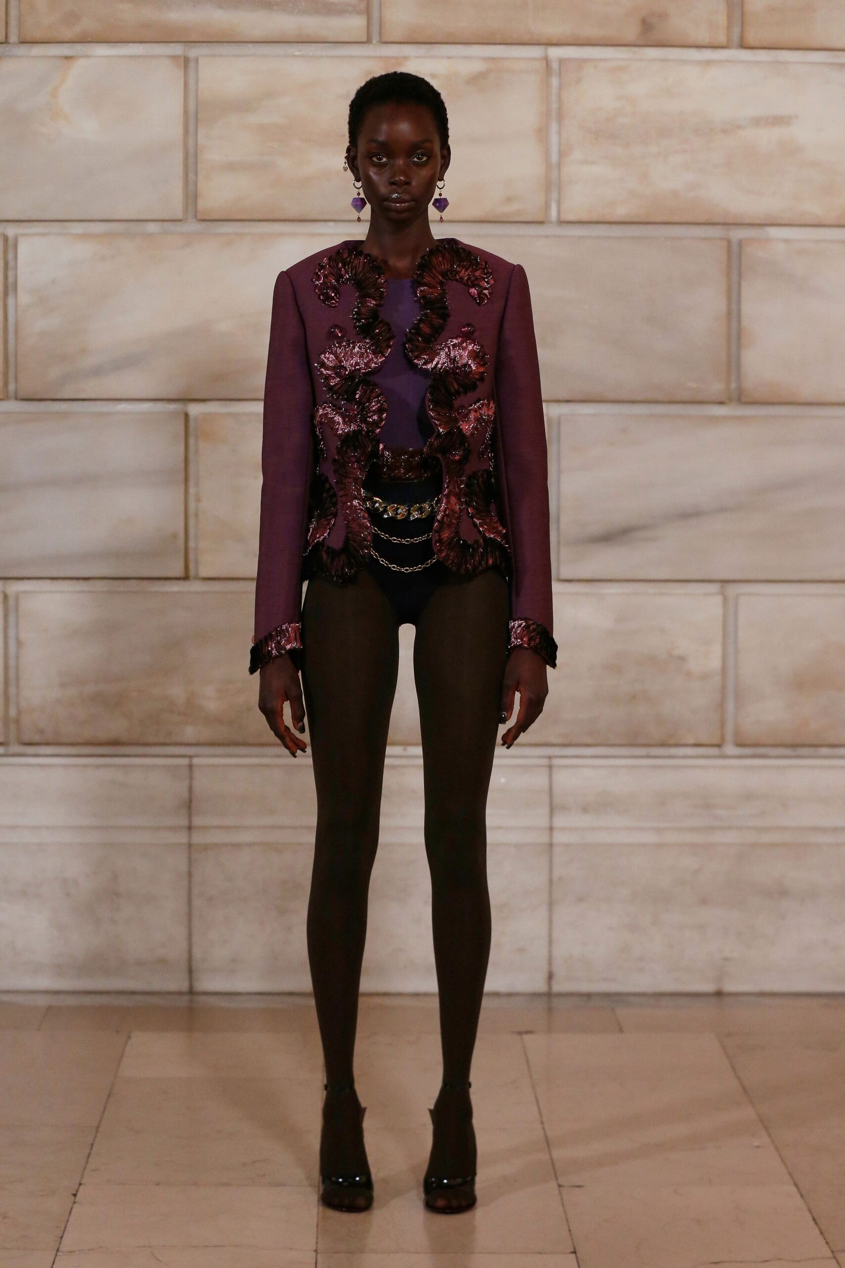 purple embroidered jacket with black bodysuit