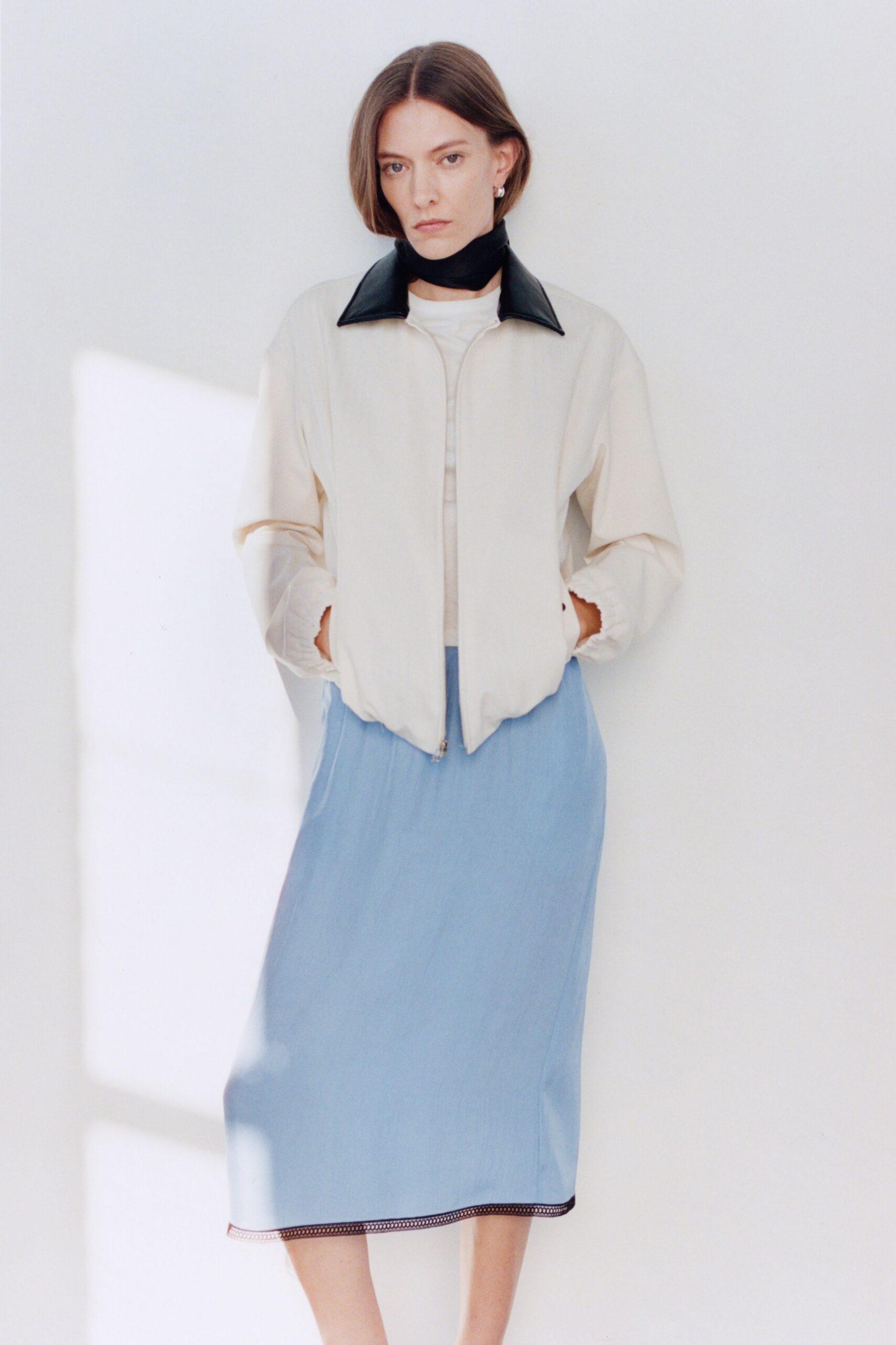 white cotton long-sleeve collared relaxed zippered jacket