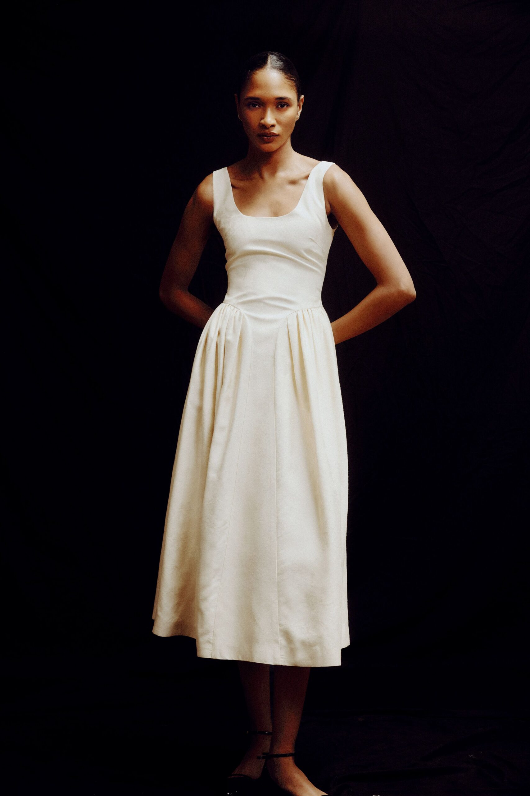 white fitted sleeveless dress