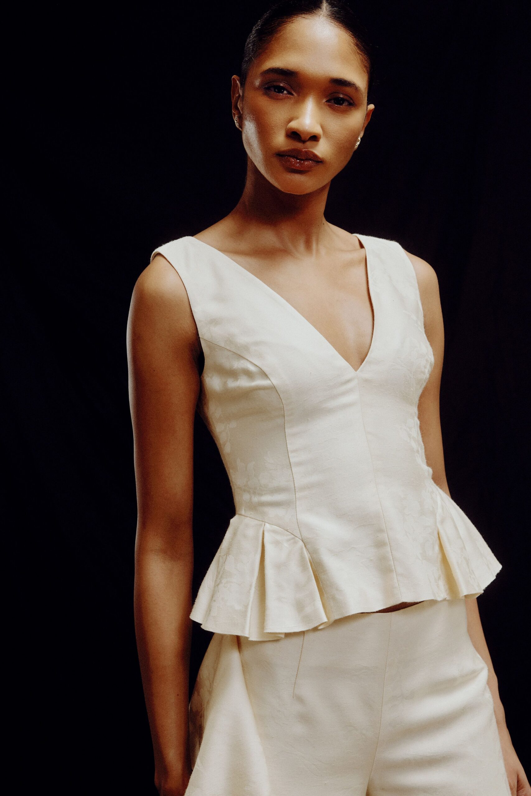 ivory cotton sleeveless v-neck fitted flared top
