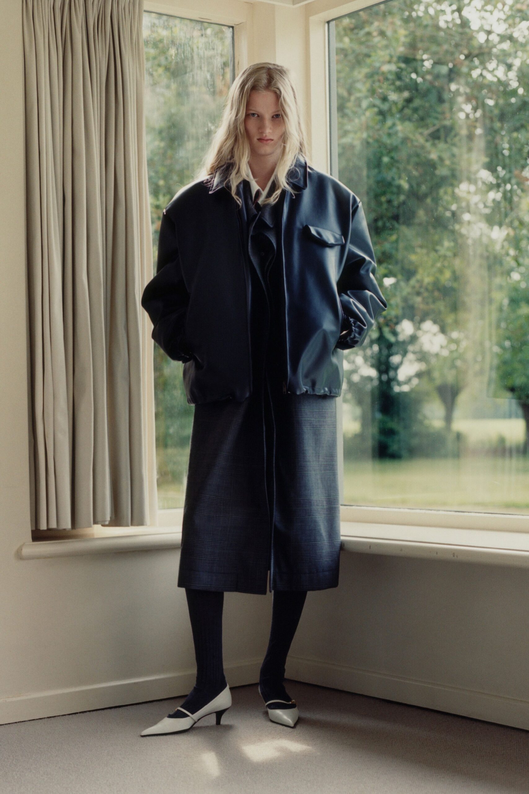oversized black vinyl jacket