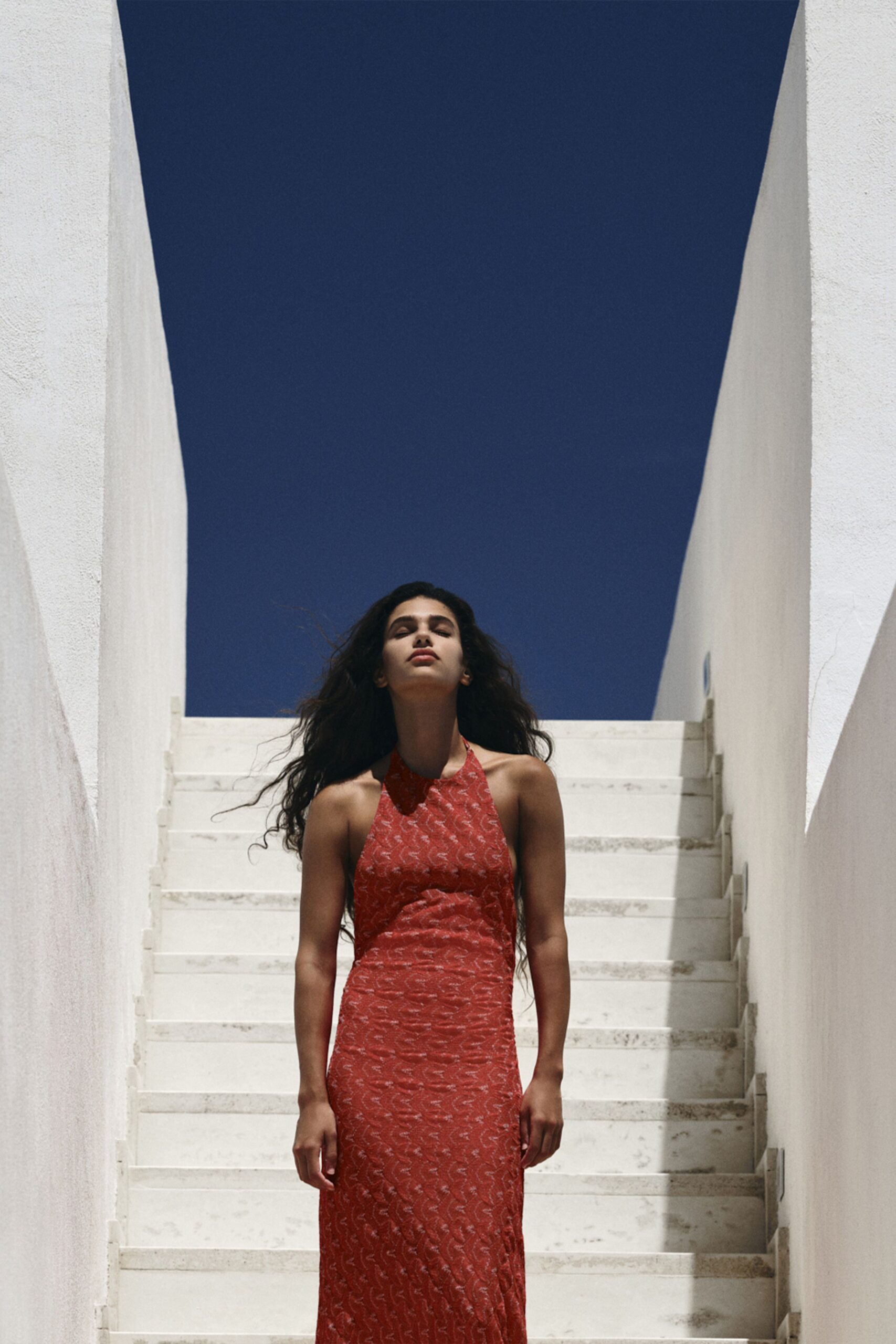 red silk sleeveless gown