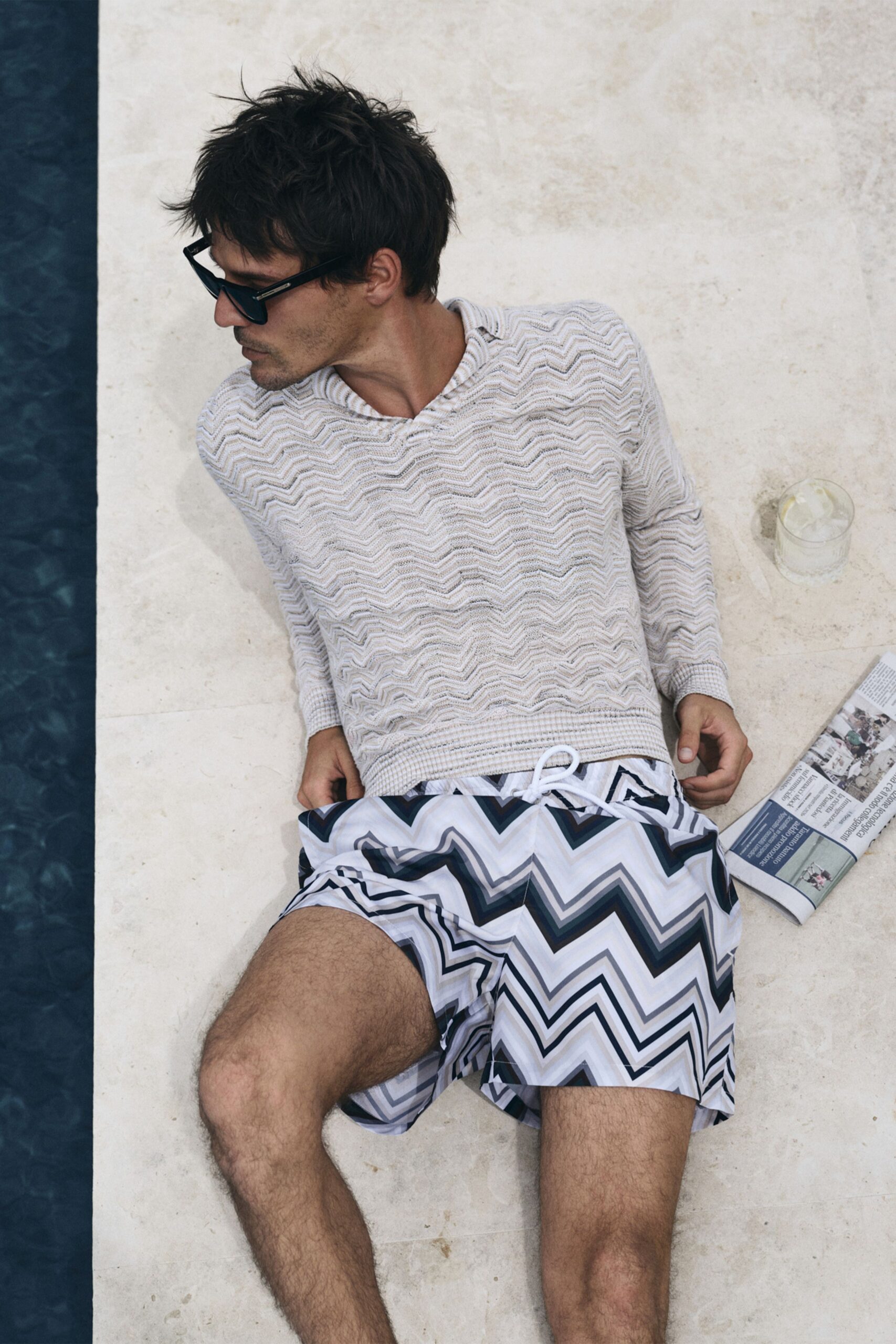 white relaxed sweater with zigzag shorts
