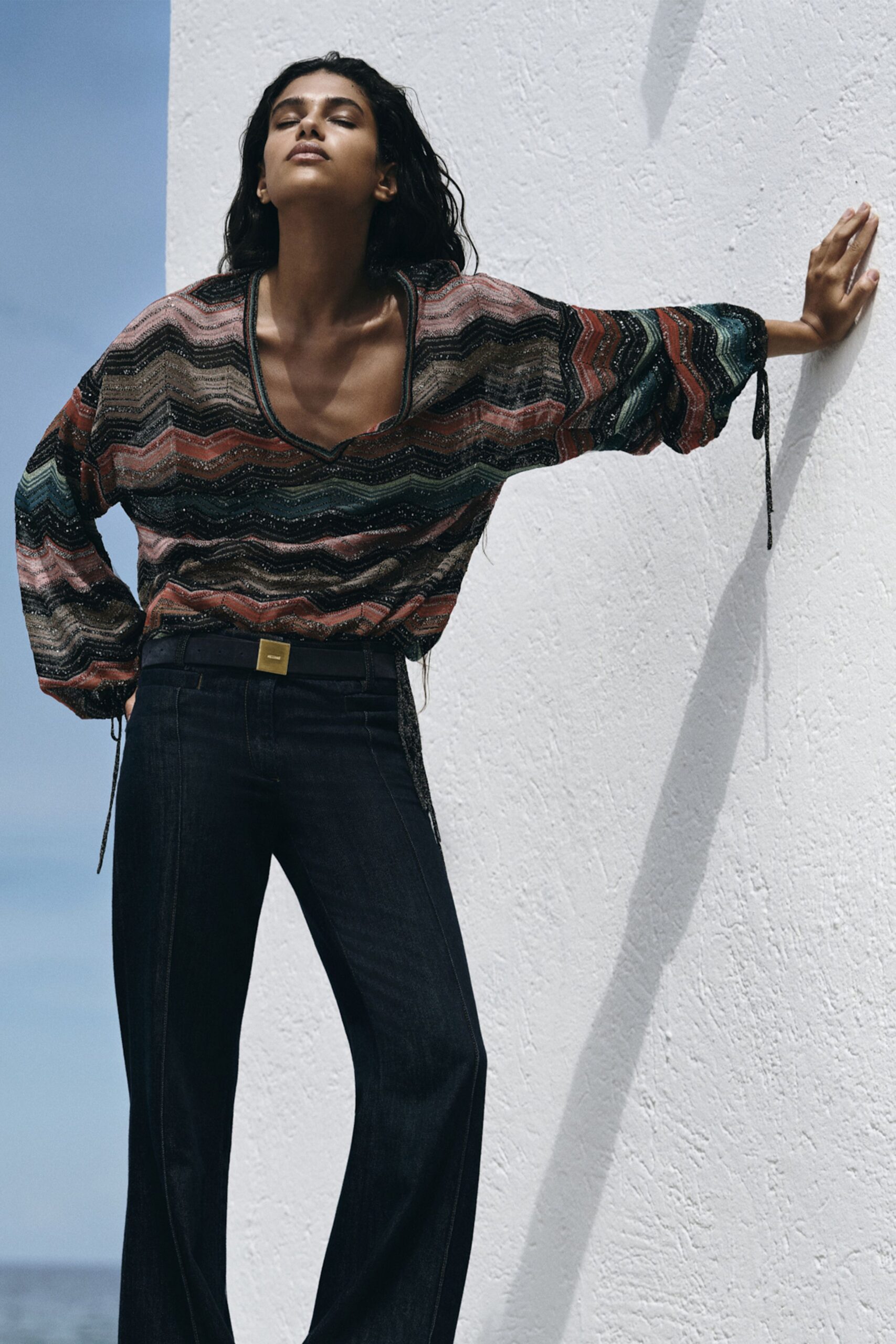 multi-colored relaxed top with black pants