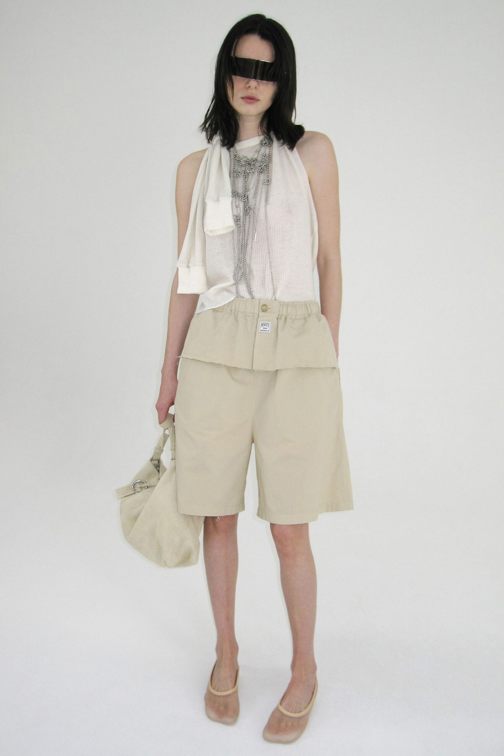 white cotton sleeveless high-neck relaxed layered top