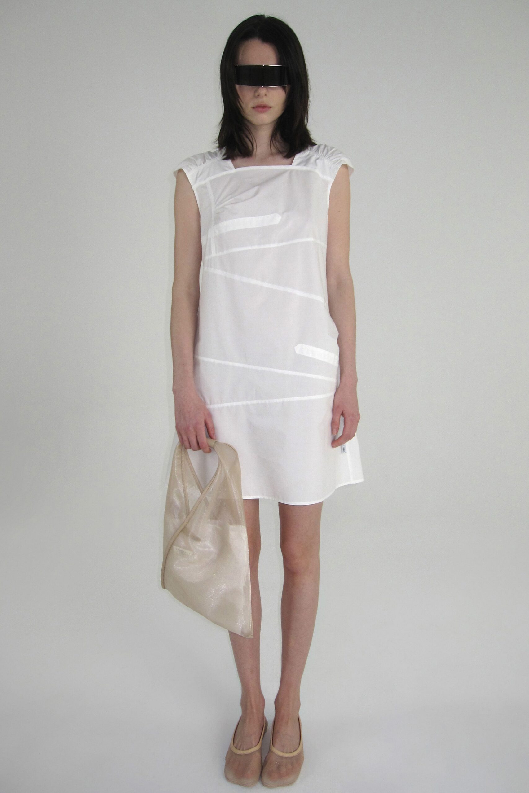 white cotton sleeveless collared relaxed pleated short dress