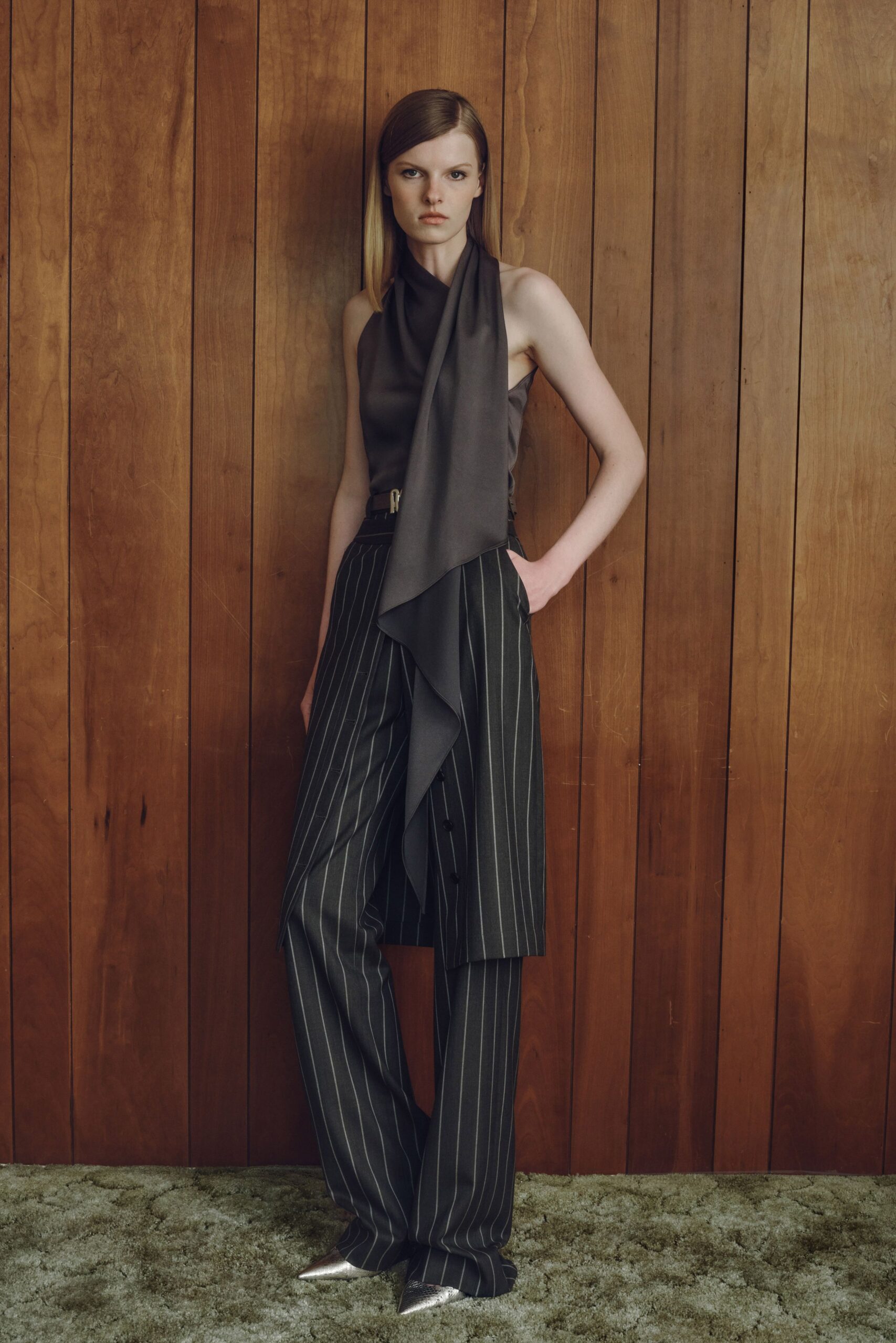 gray silk sleeveless high-neck fitted draped top