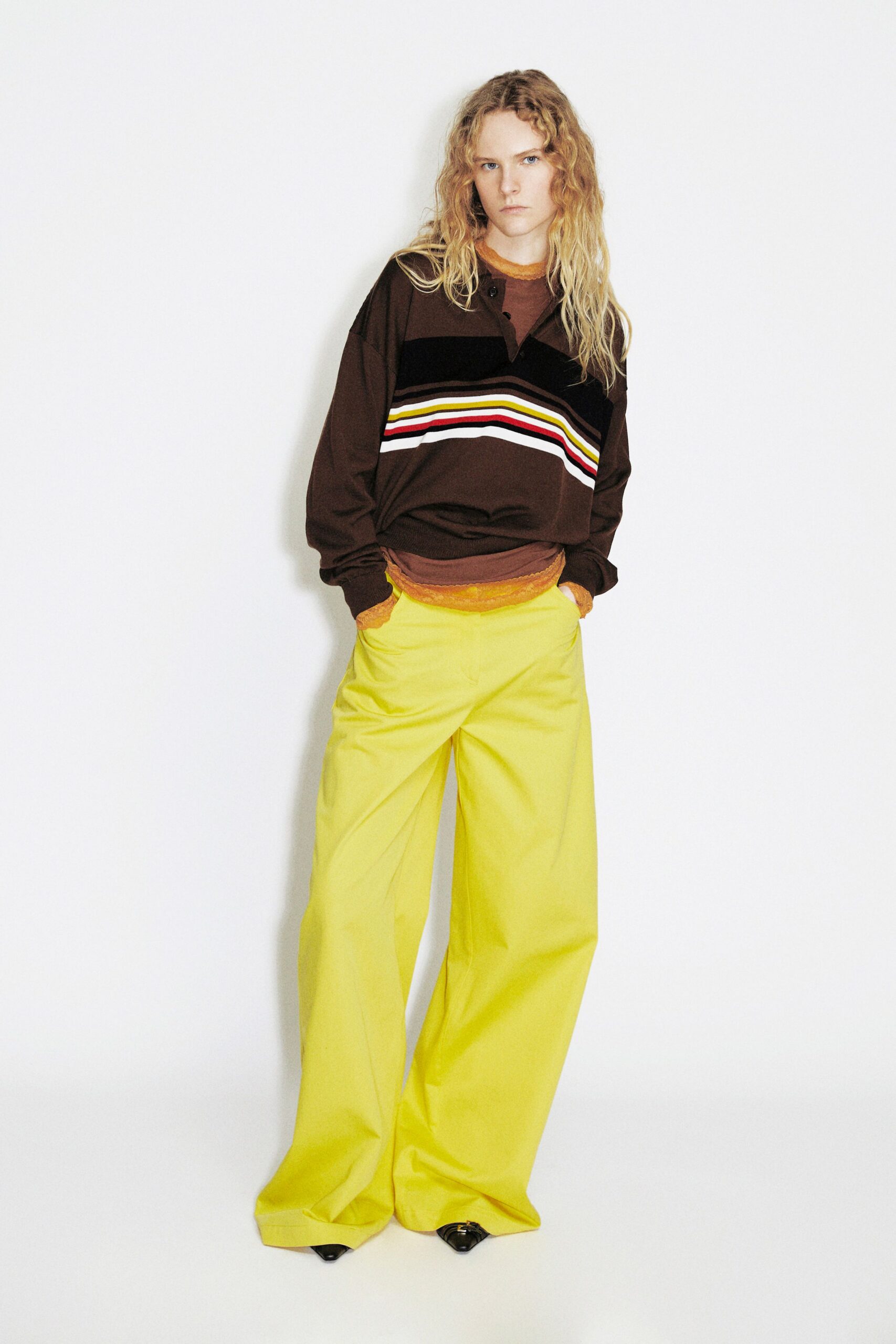 brown striped top yellow pants