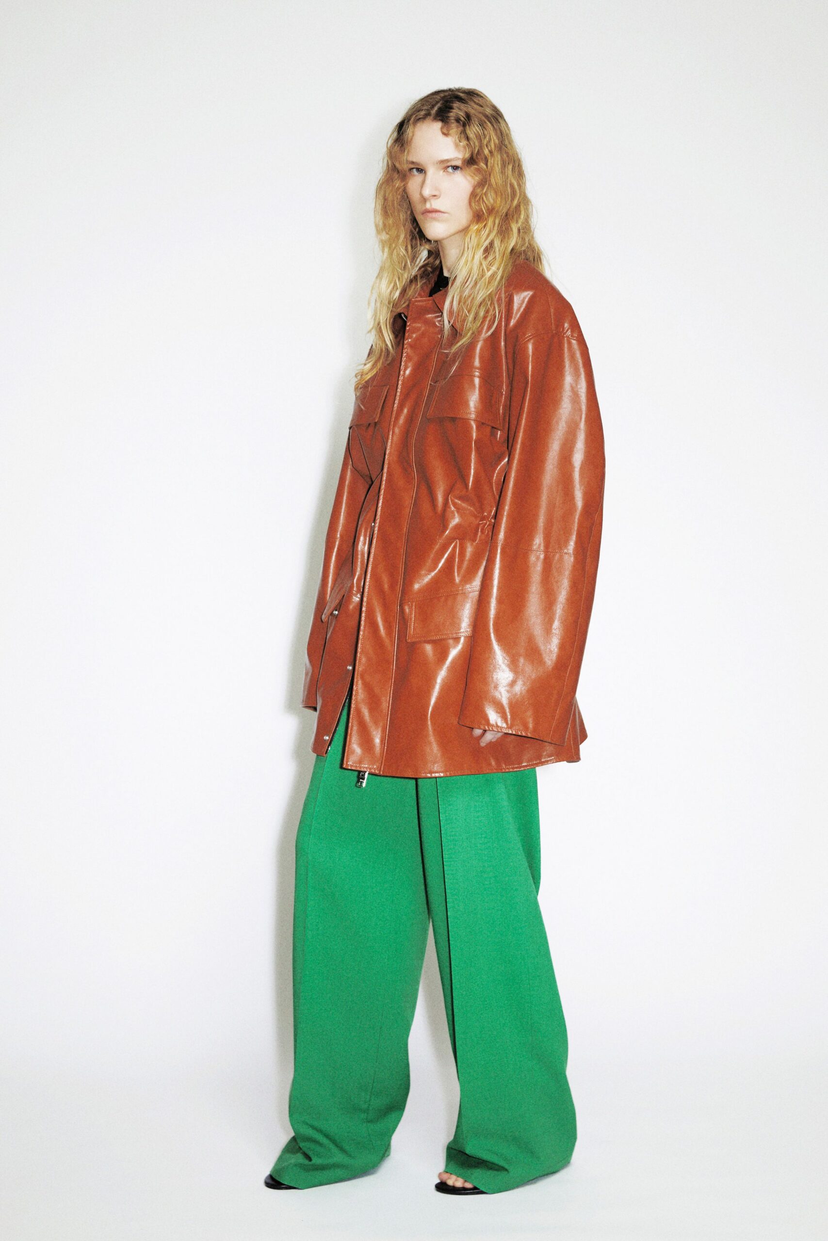 brown leather oversized jacket with green pants