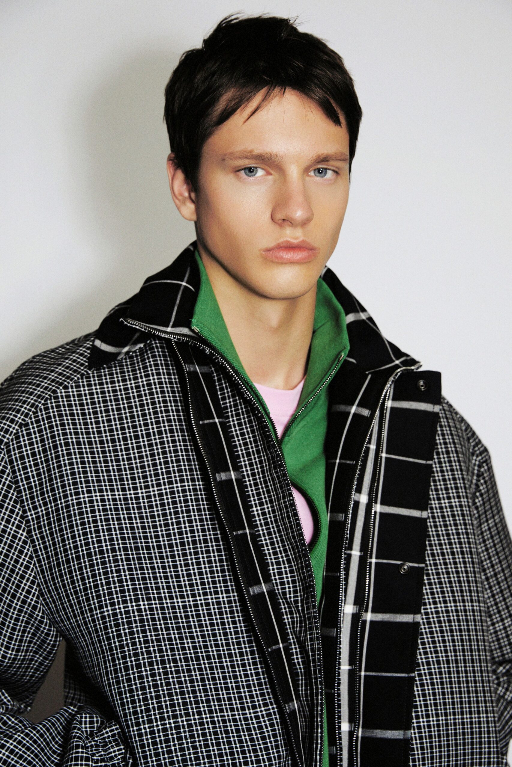 checked jacket with green top